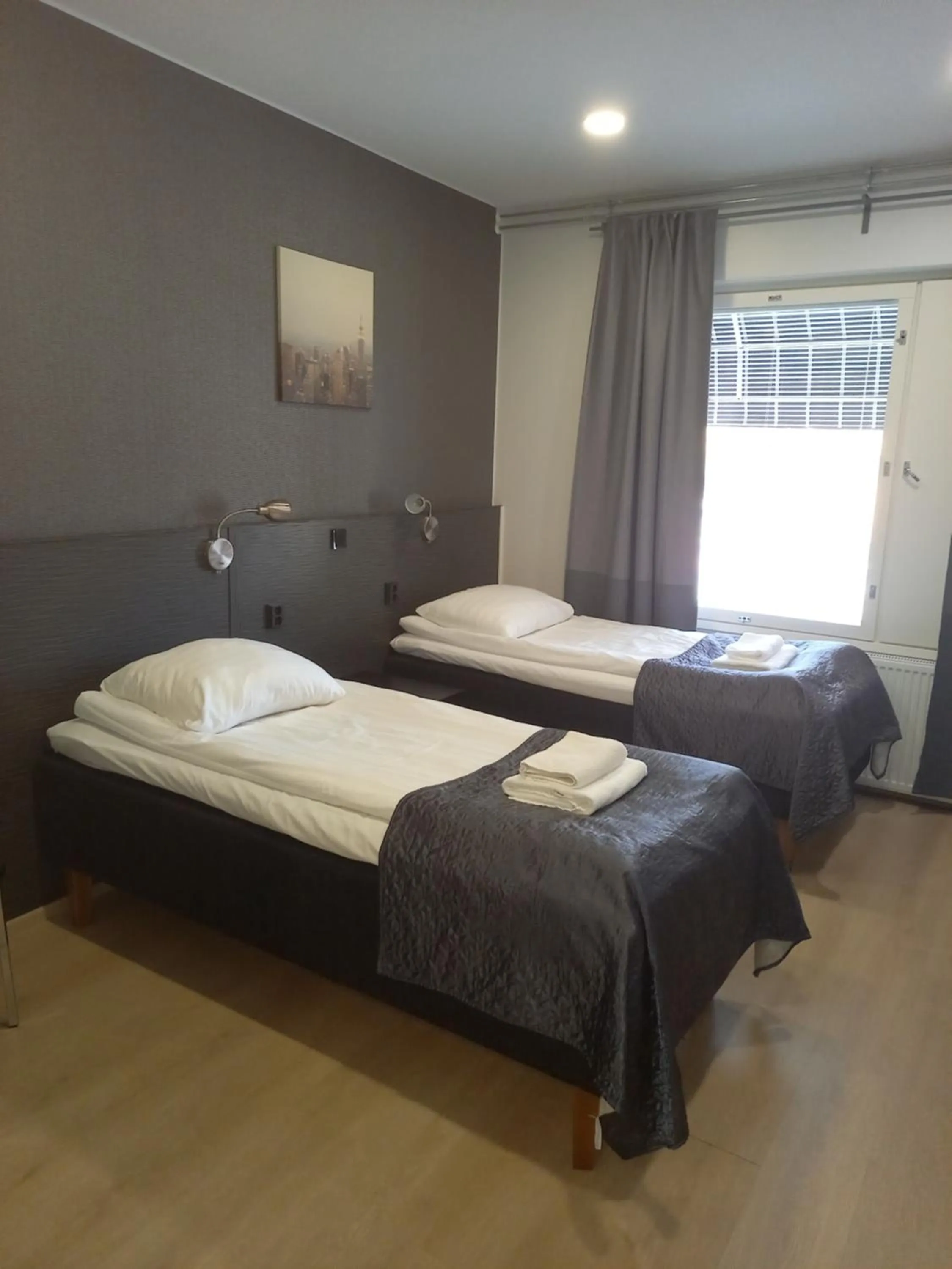 Kitchen or kitchenette, Bed in Hotelli Marilyn