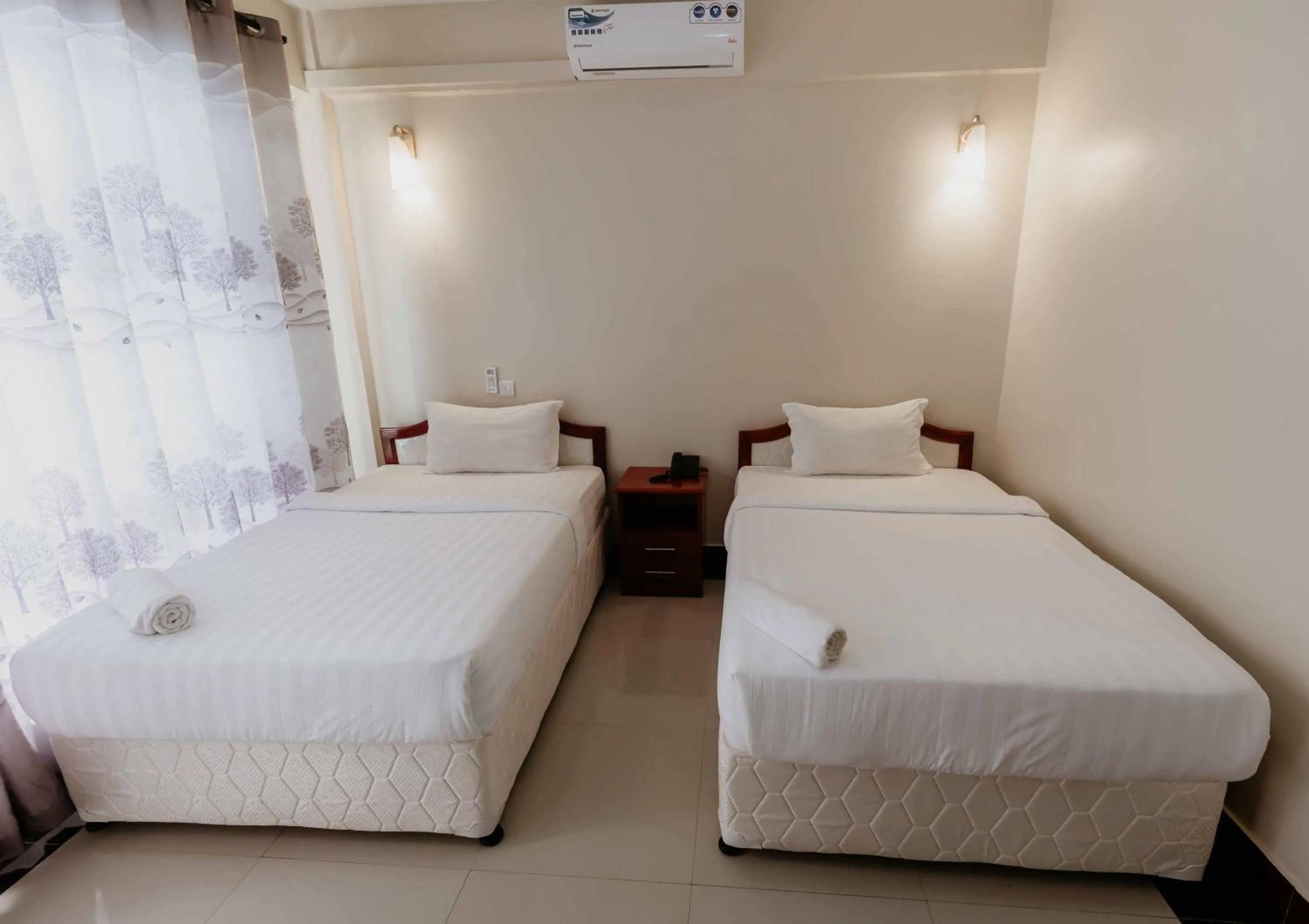 Bed in Panama Garden Resort