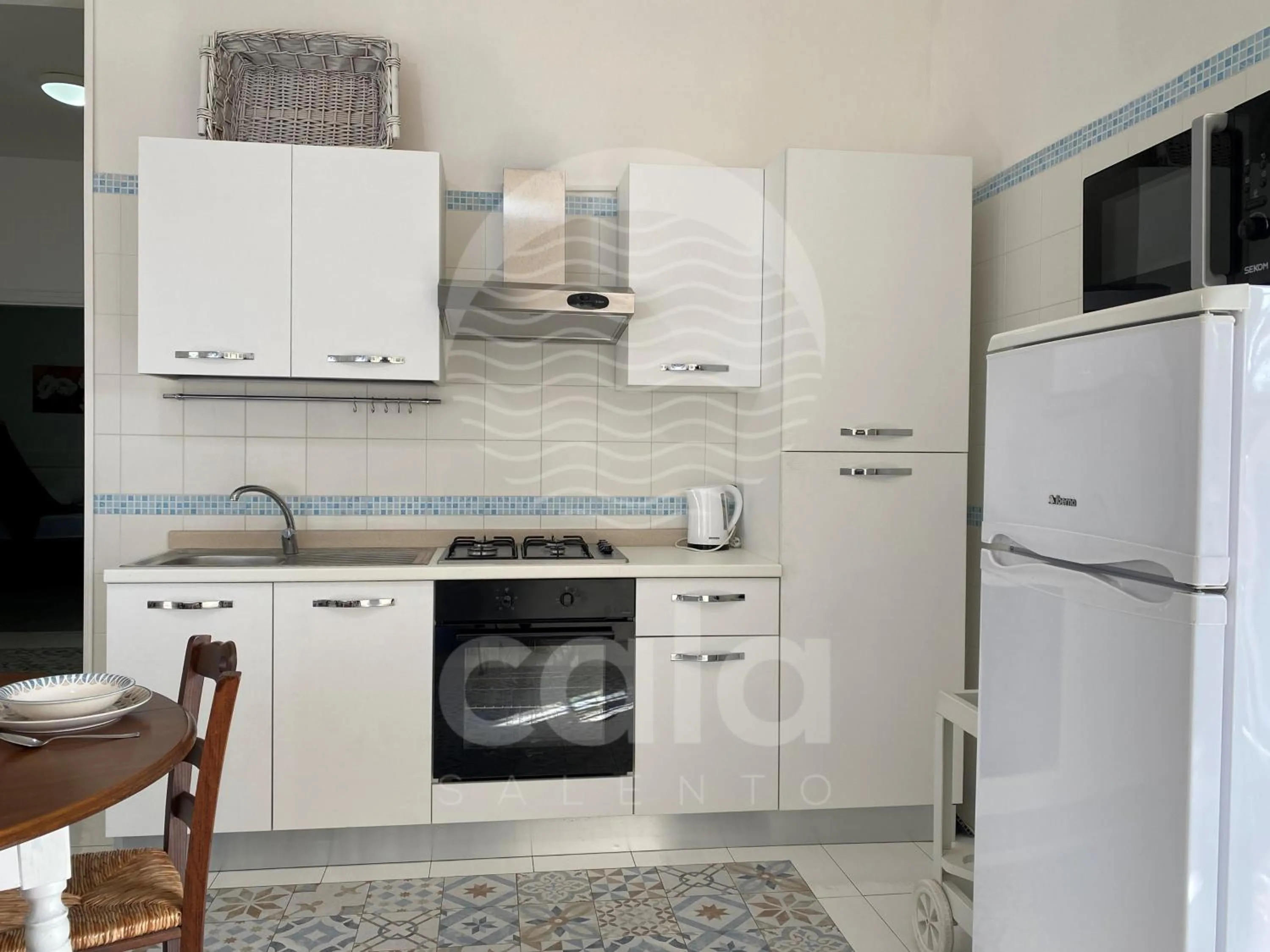 Kitchen or kitchenette in Villa Teresa - giardino privato By Cala Salento