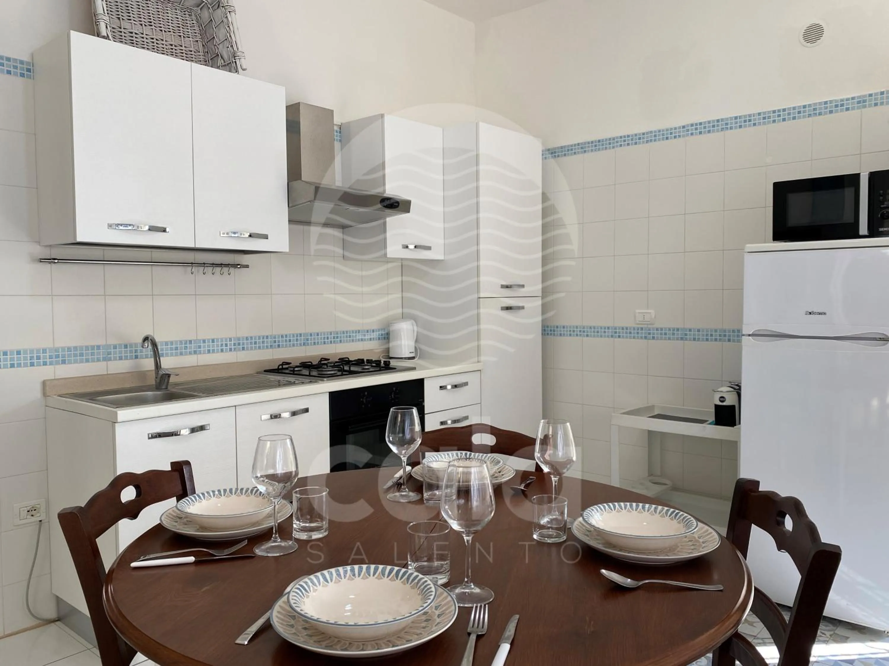 Kitchen or kitchenette in Villa Teresa - giardino privato By Cala Salento