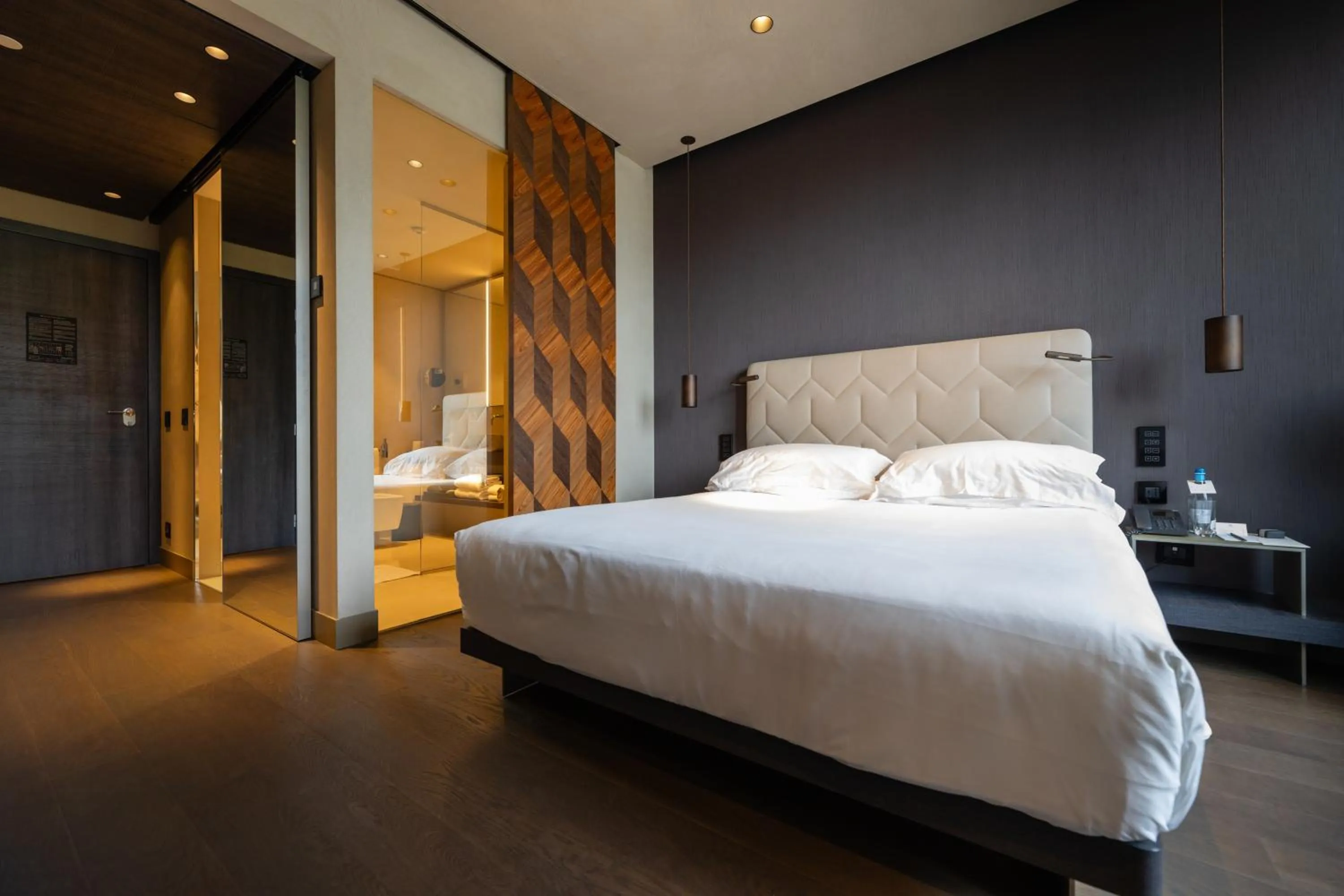 Shower, Bed in Hotel VIU Milan, a Member of Design Hotels
