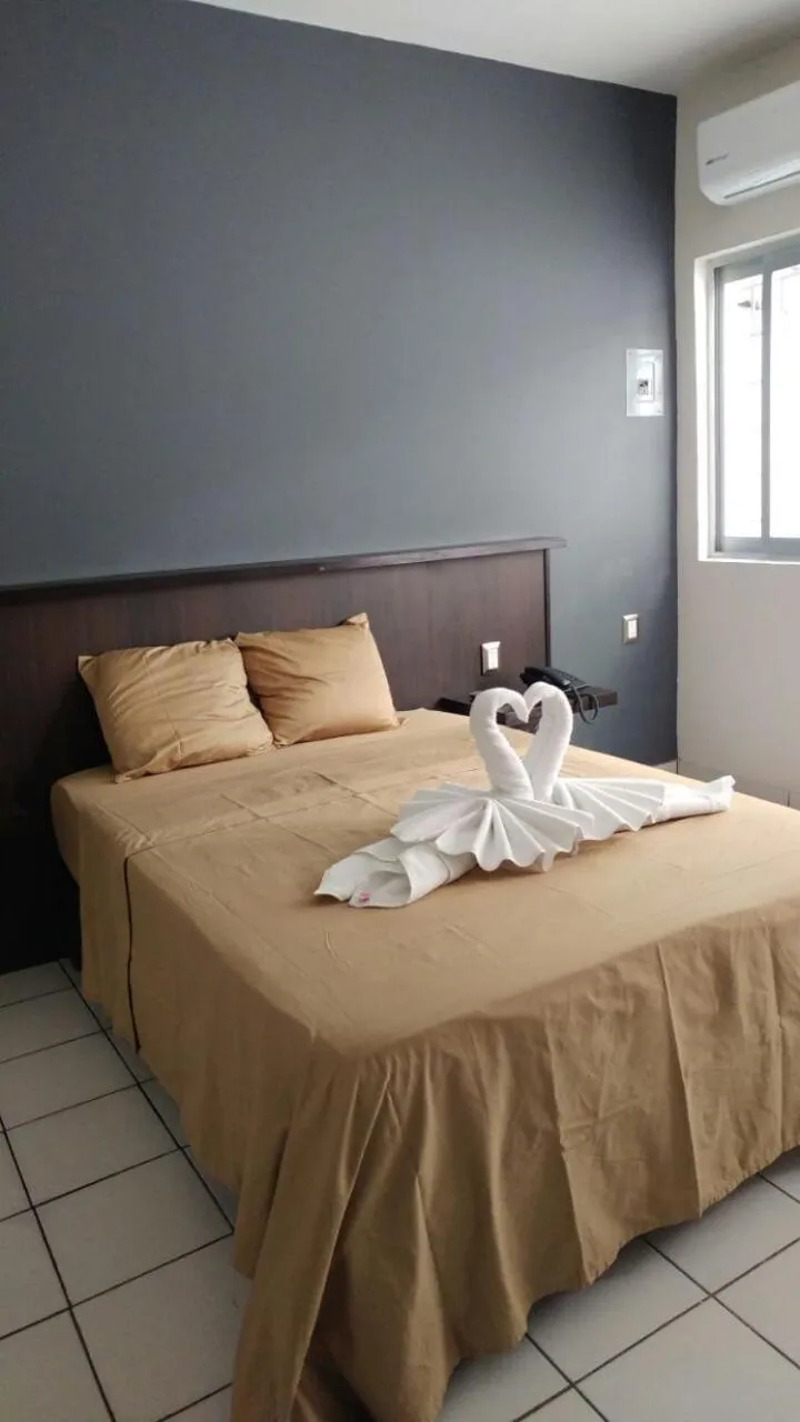 Bed in Hotel Peccato Originale