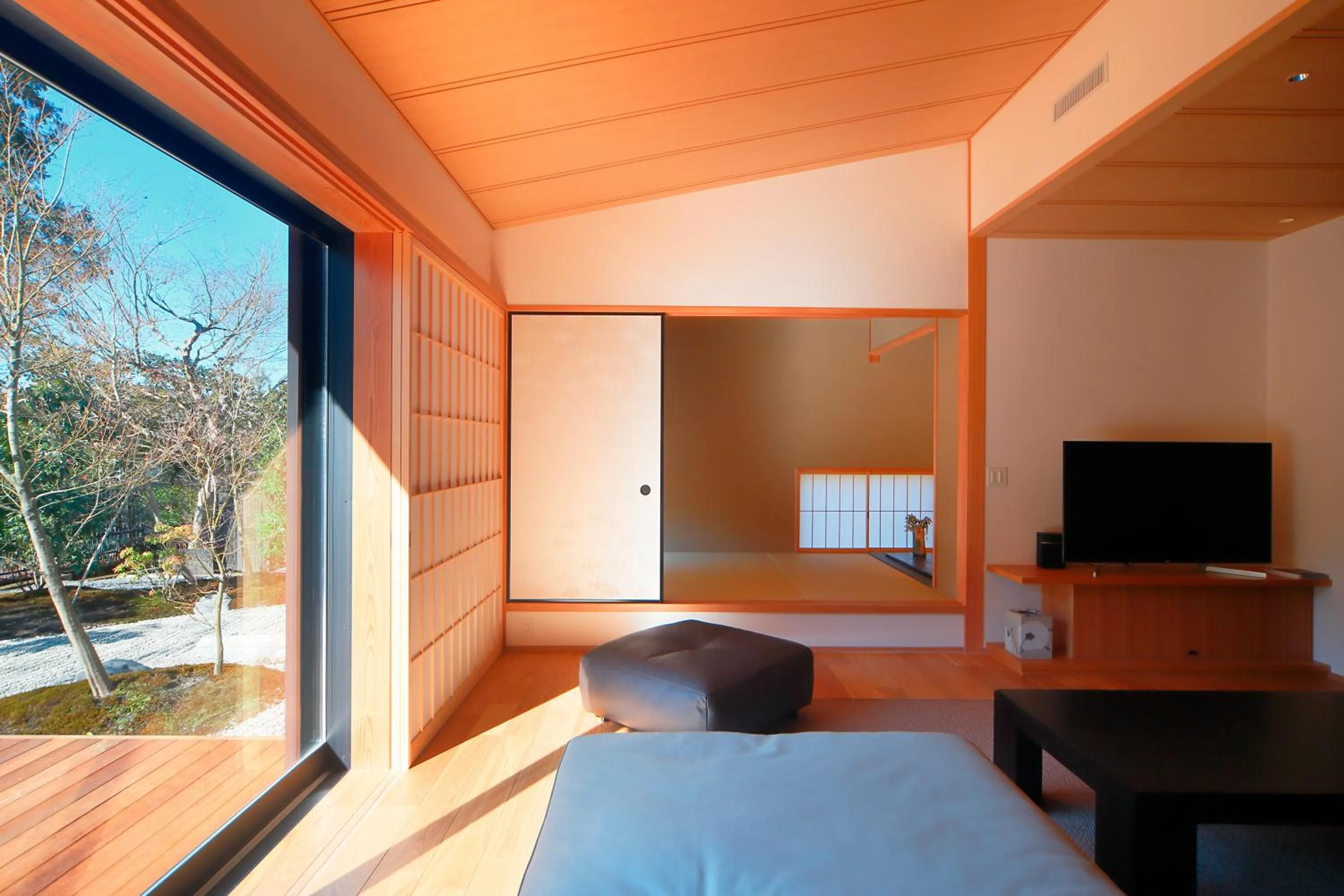 Living room, Bed in Aoi Suites at Nanzenji Modern & Traditional Japanese Style