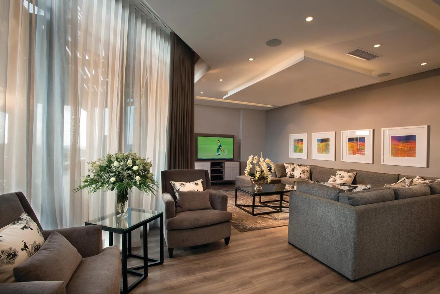 Communal lounge/ TV room in DAVINCI Suites