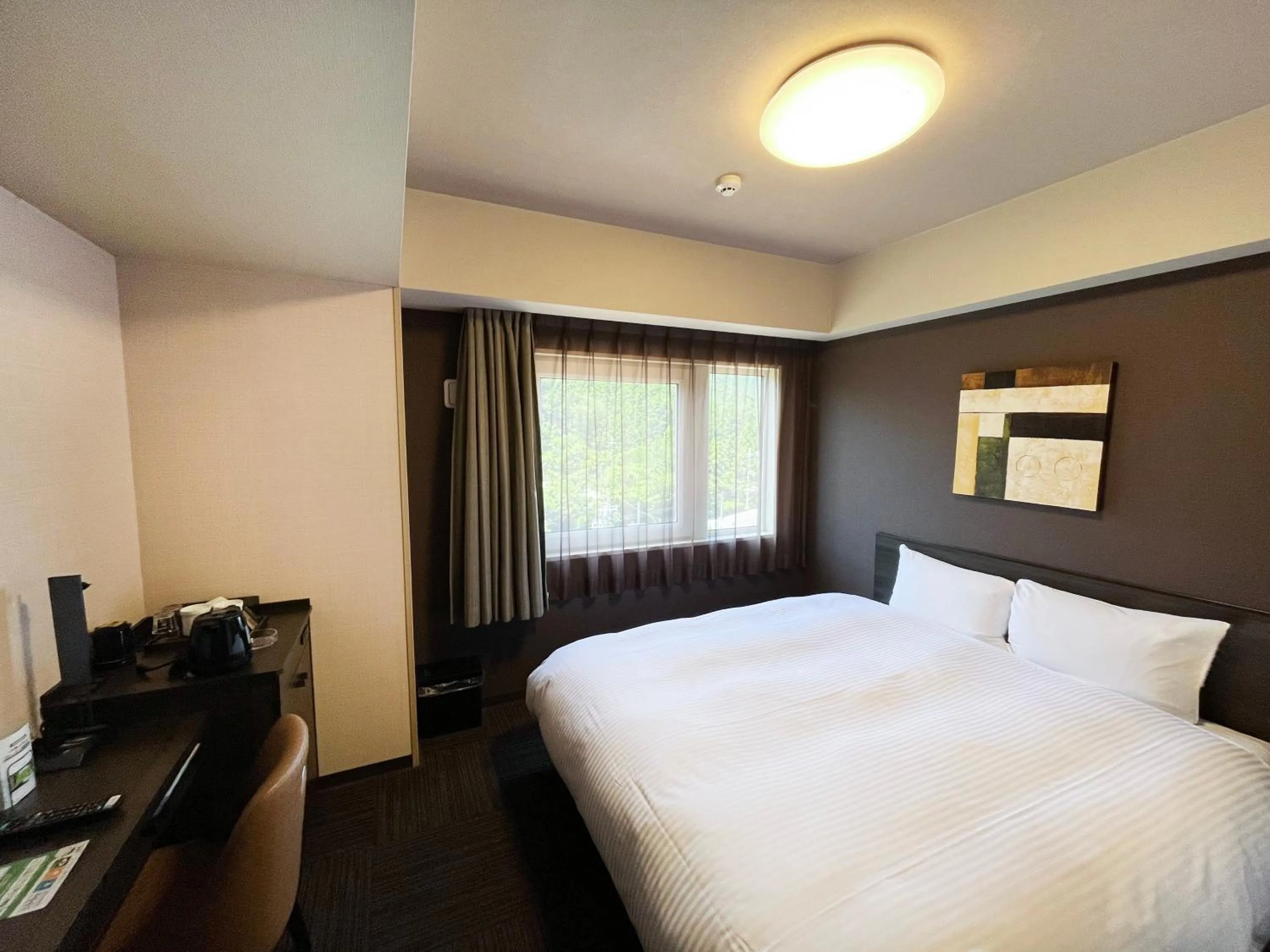 Bedroom, Bed in Hotel Route-Inn Higashiomi Yokaichi Ekimae