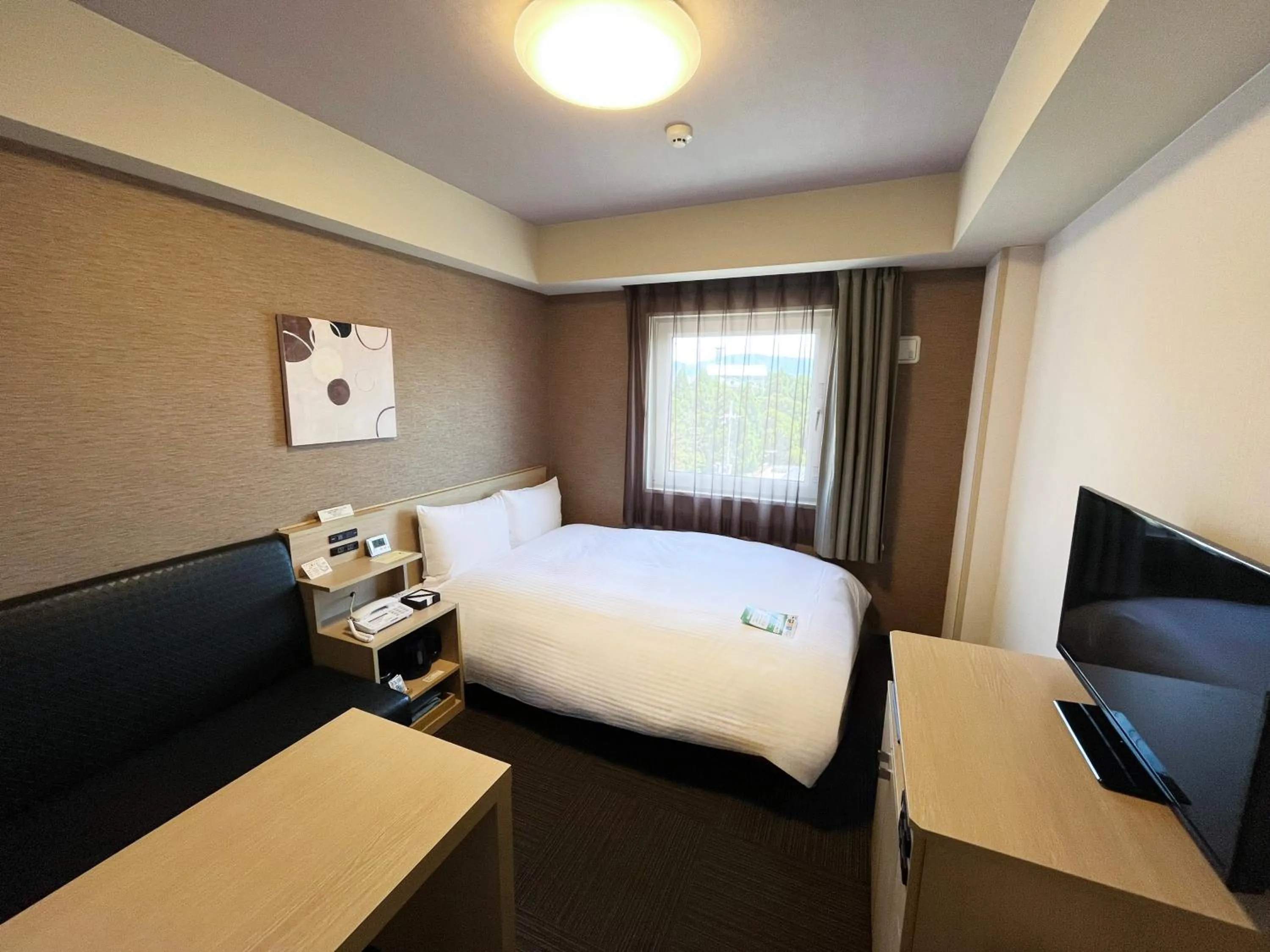 Bedroom, Bed in Hotel Route-Inn Higashiomi Yokaichi Ekimae