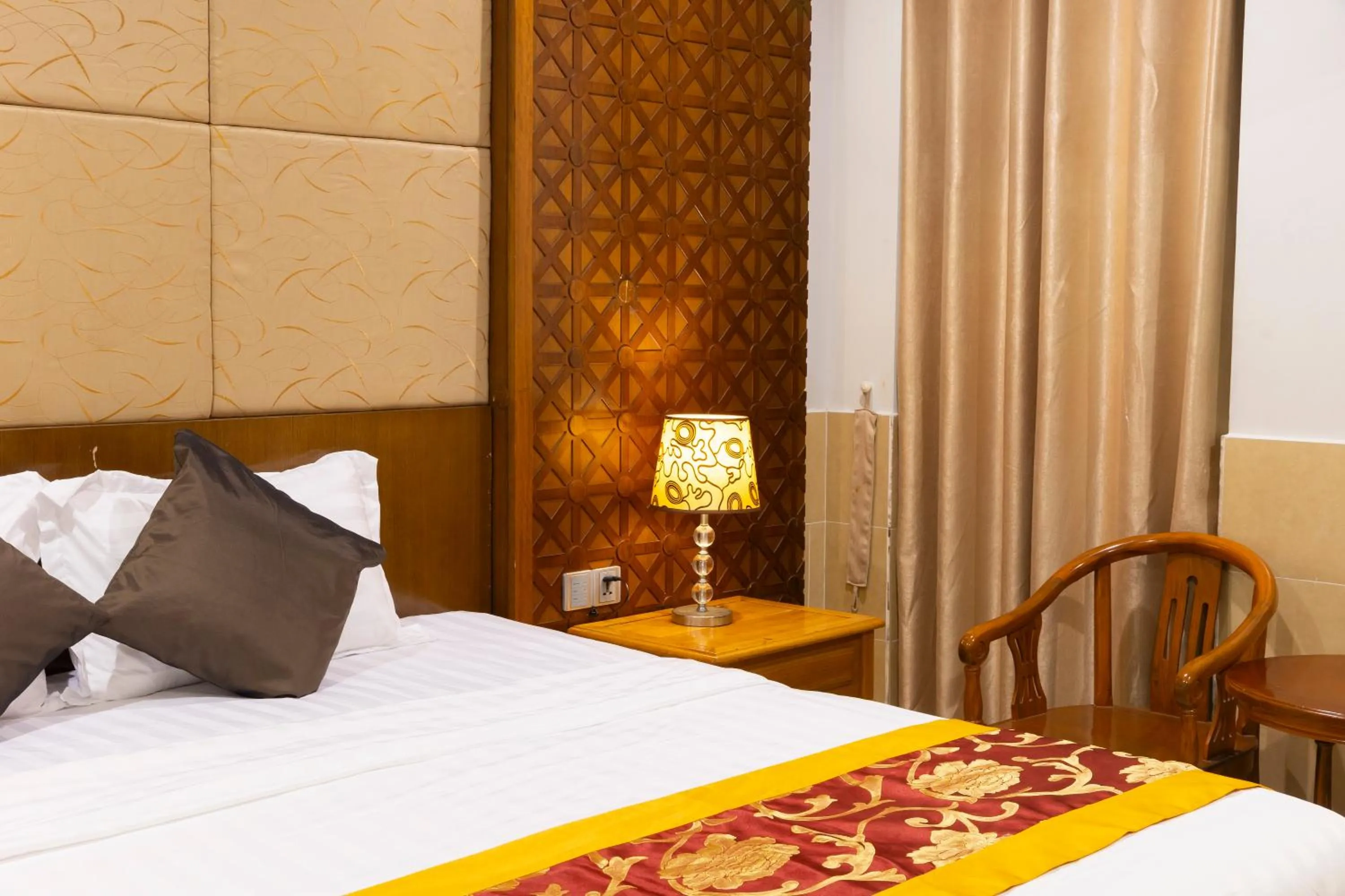 Bed in Hoang Anh Star Boutique Hotel