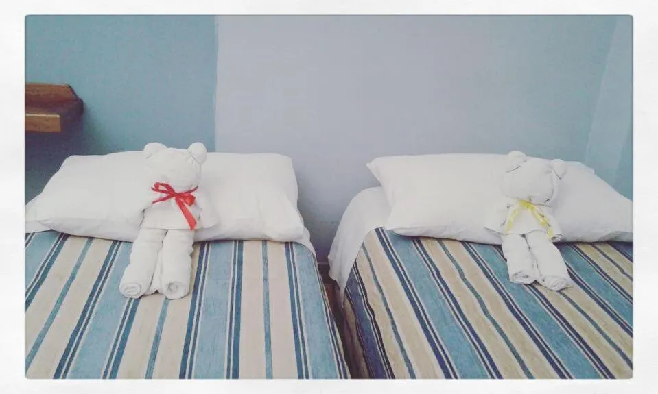 Bed in Aragonese Luxury Rooms