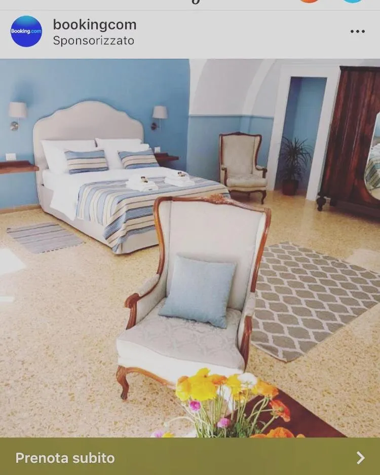 Bed in Aragonese Luxury Rooms