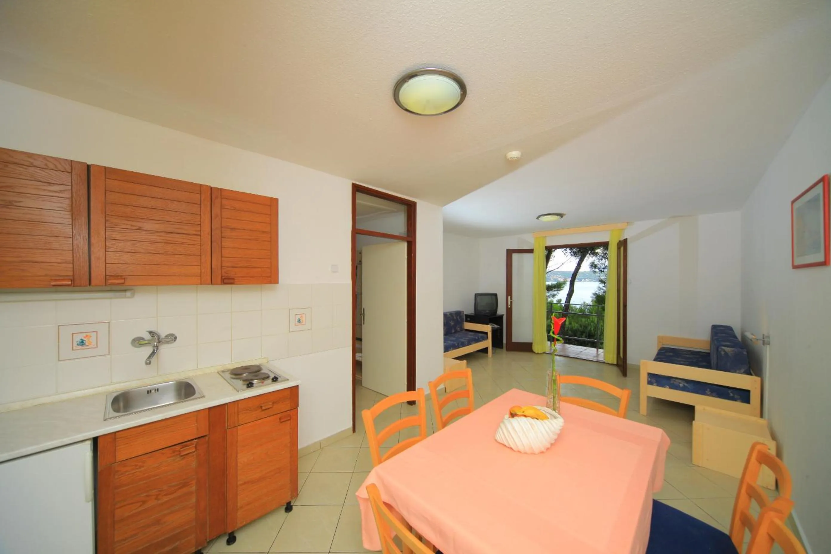 Kitchen or kitchenette in Apartments Kanegra Plava Laguna