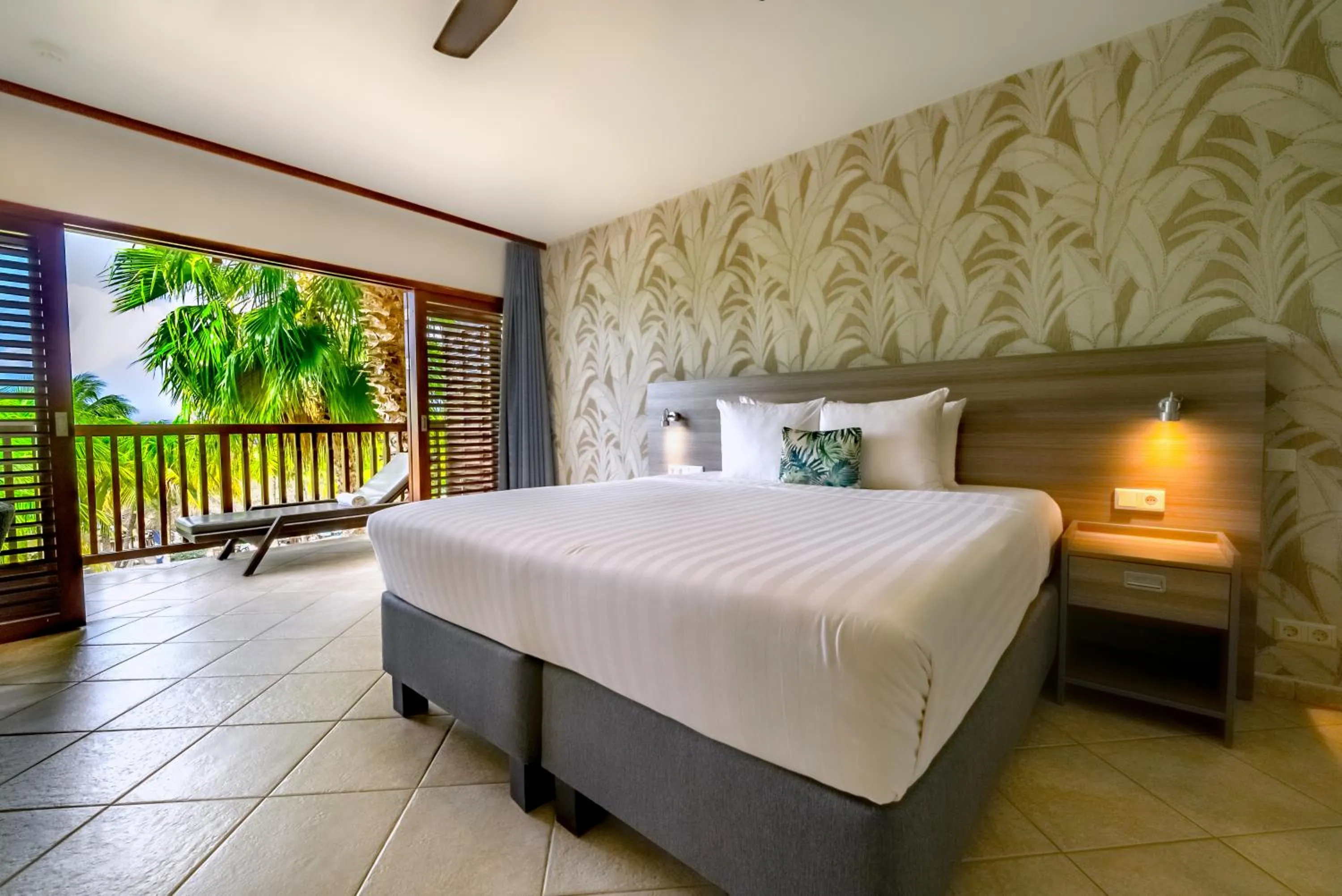 Bed in LionsDive Beach Resort