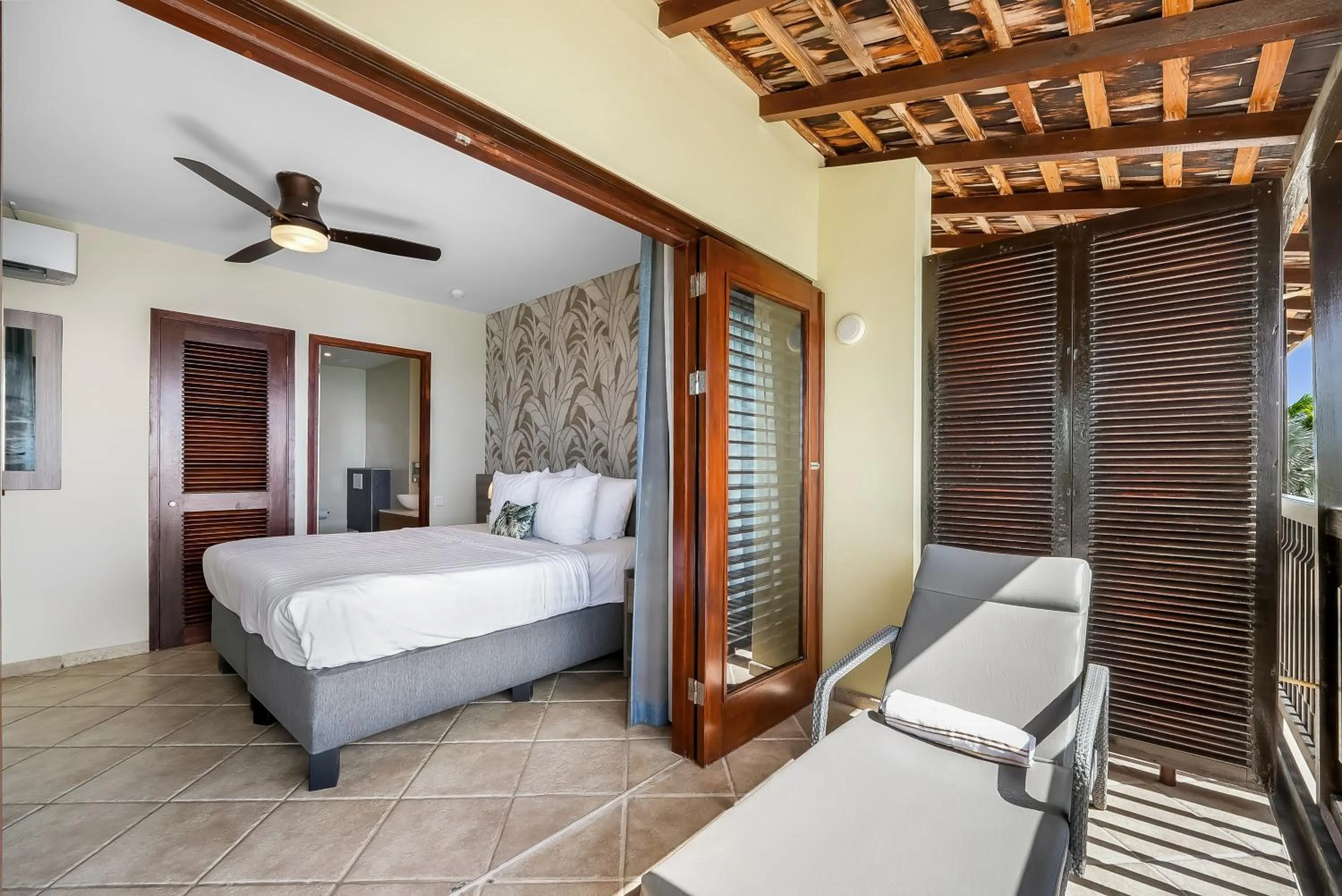 Bed in LionsDive Beach Resort