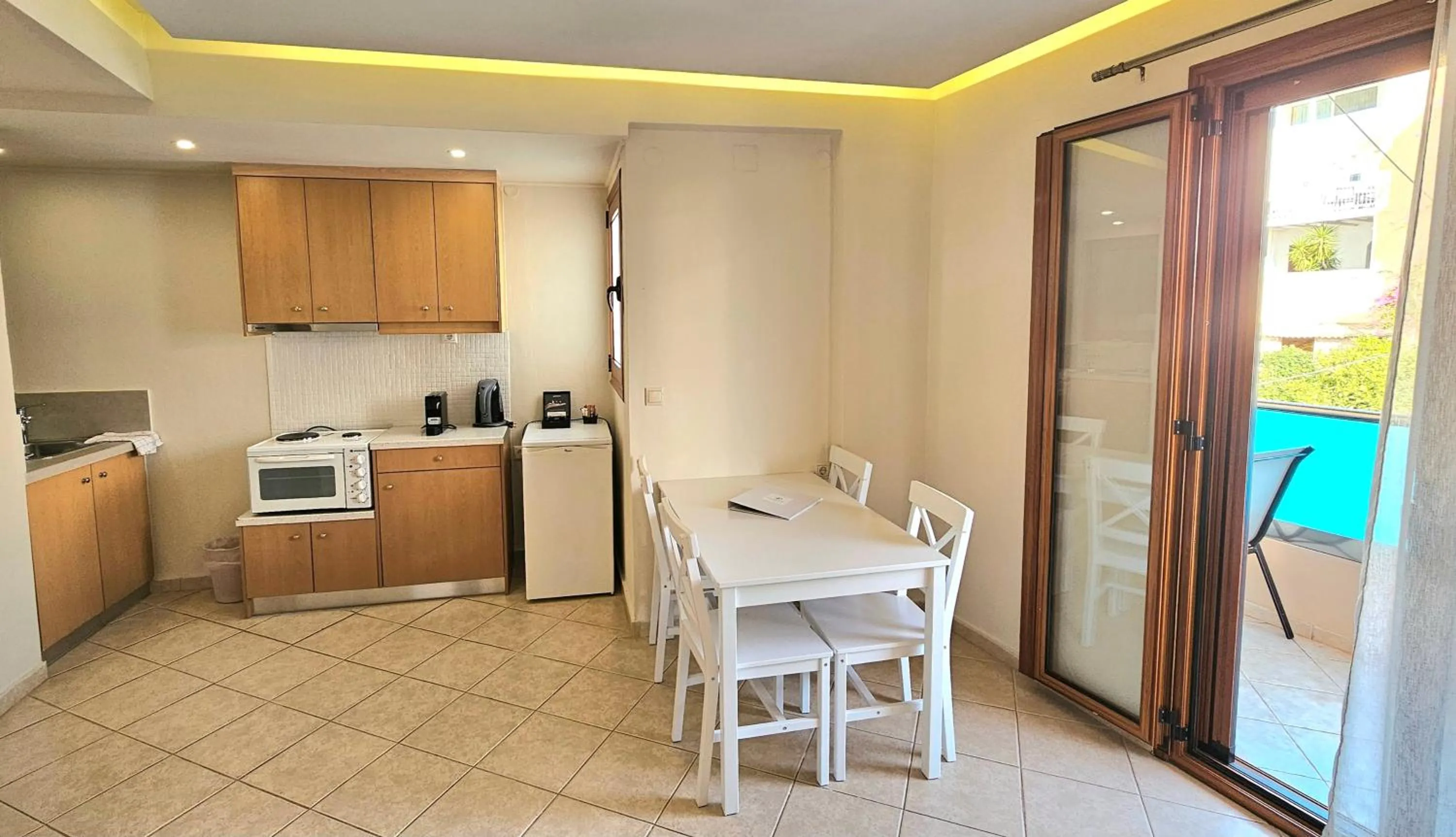 Kitchen or kitchenette in Minos Boutique Hotel