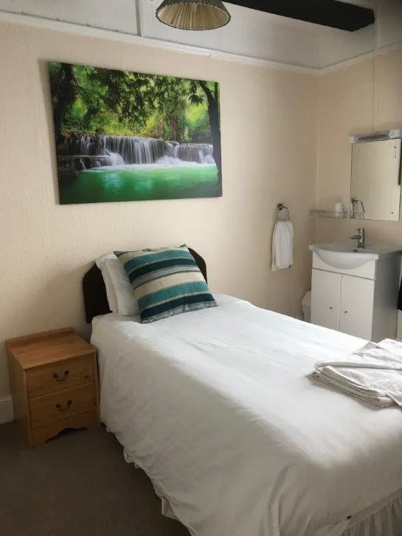 Bed in The Black Swan Inn