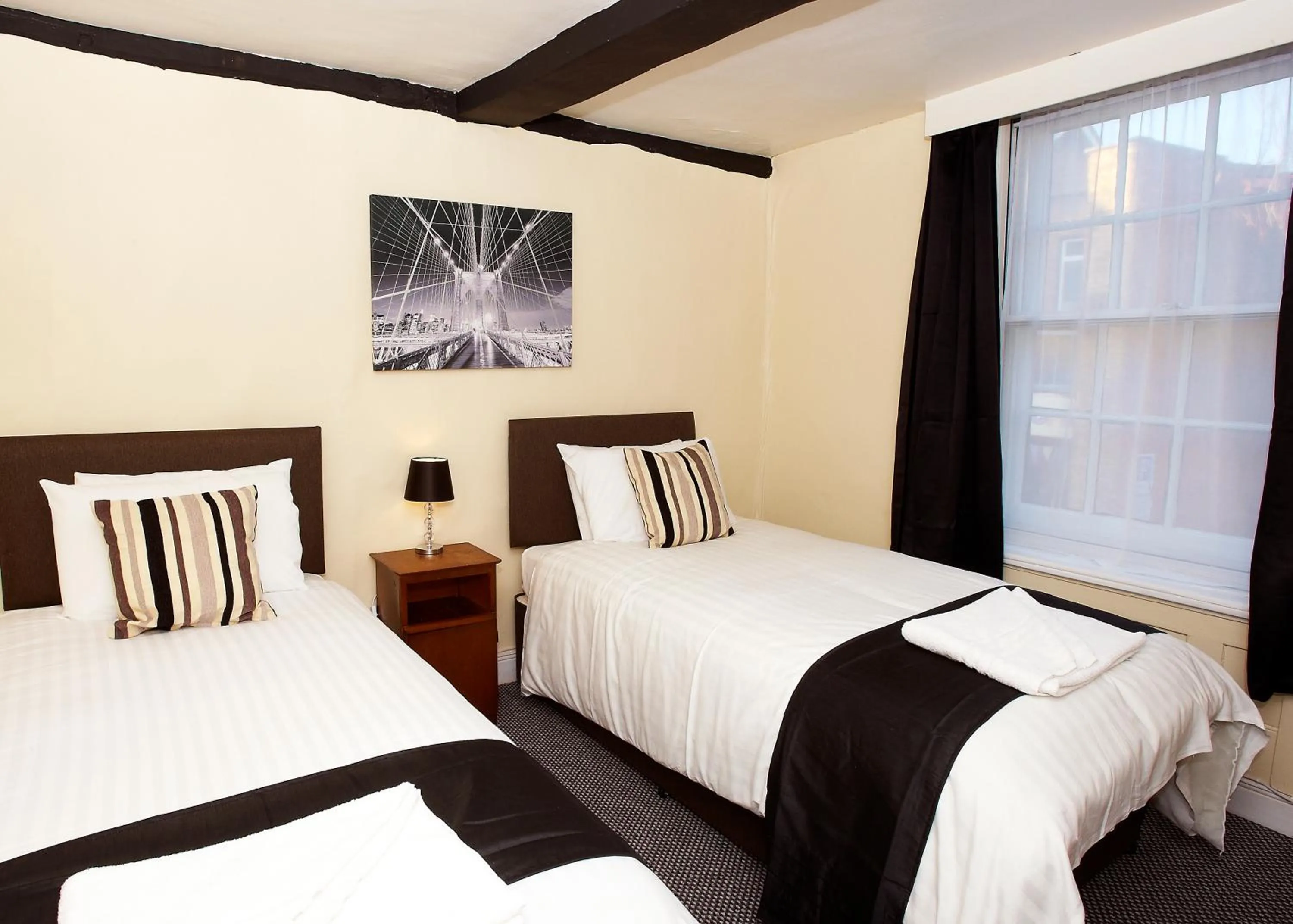 Bed in The Black Swan Inn