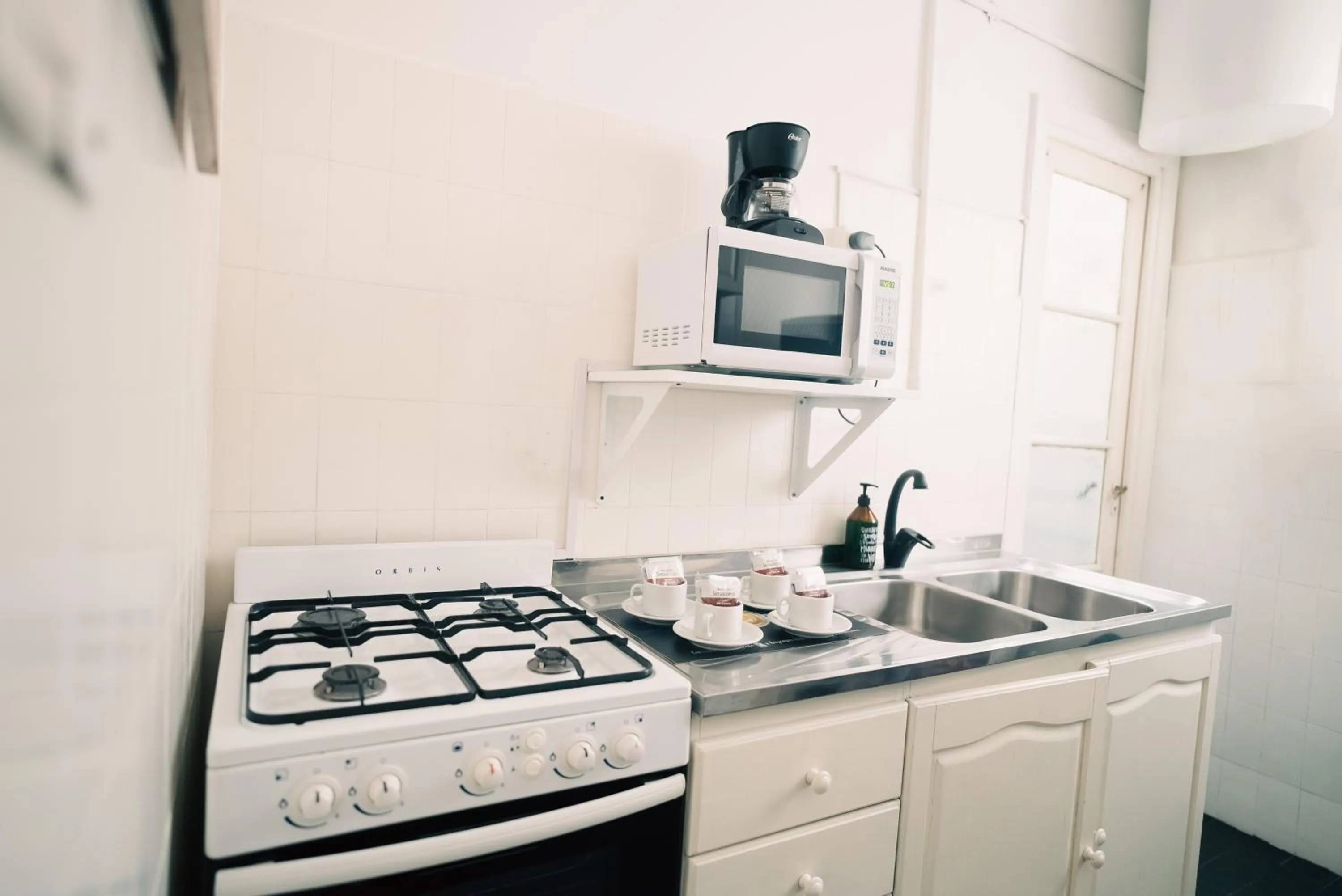 Kitchen or kitchenette in Sucre Suites