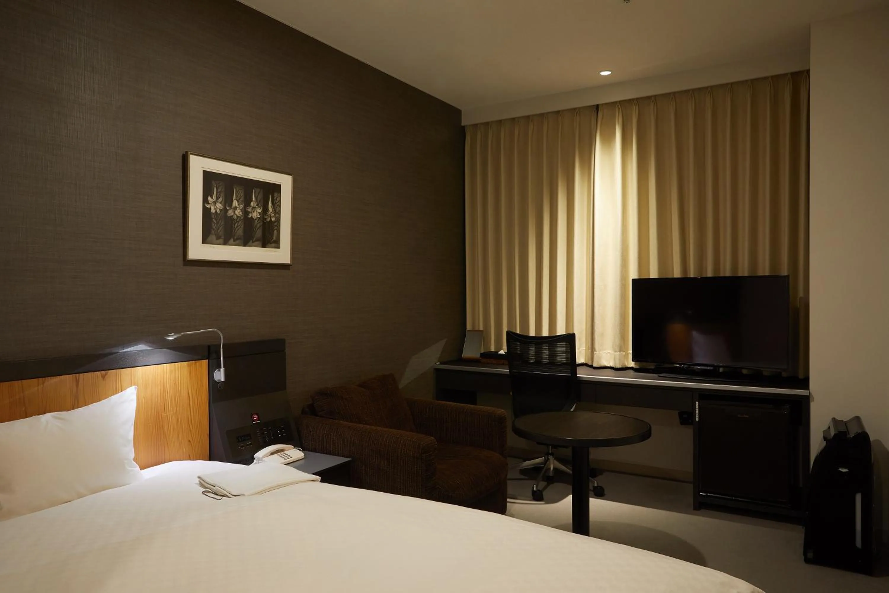 Bed in Rhino Hotel Kyoto