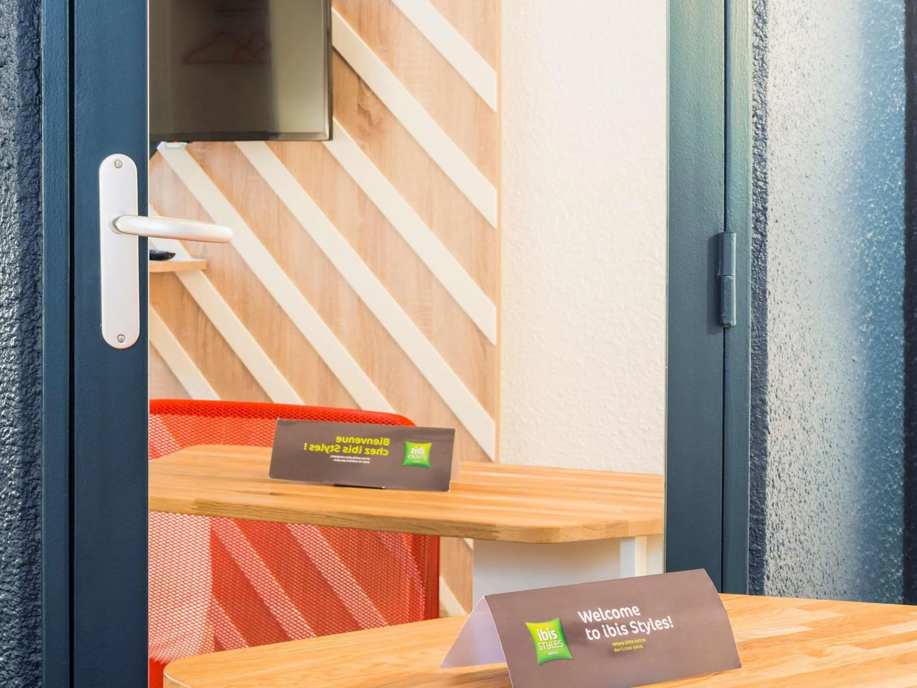 Bedroom in ibis Styles Rouen Val De Reuil