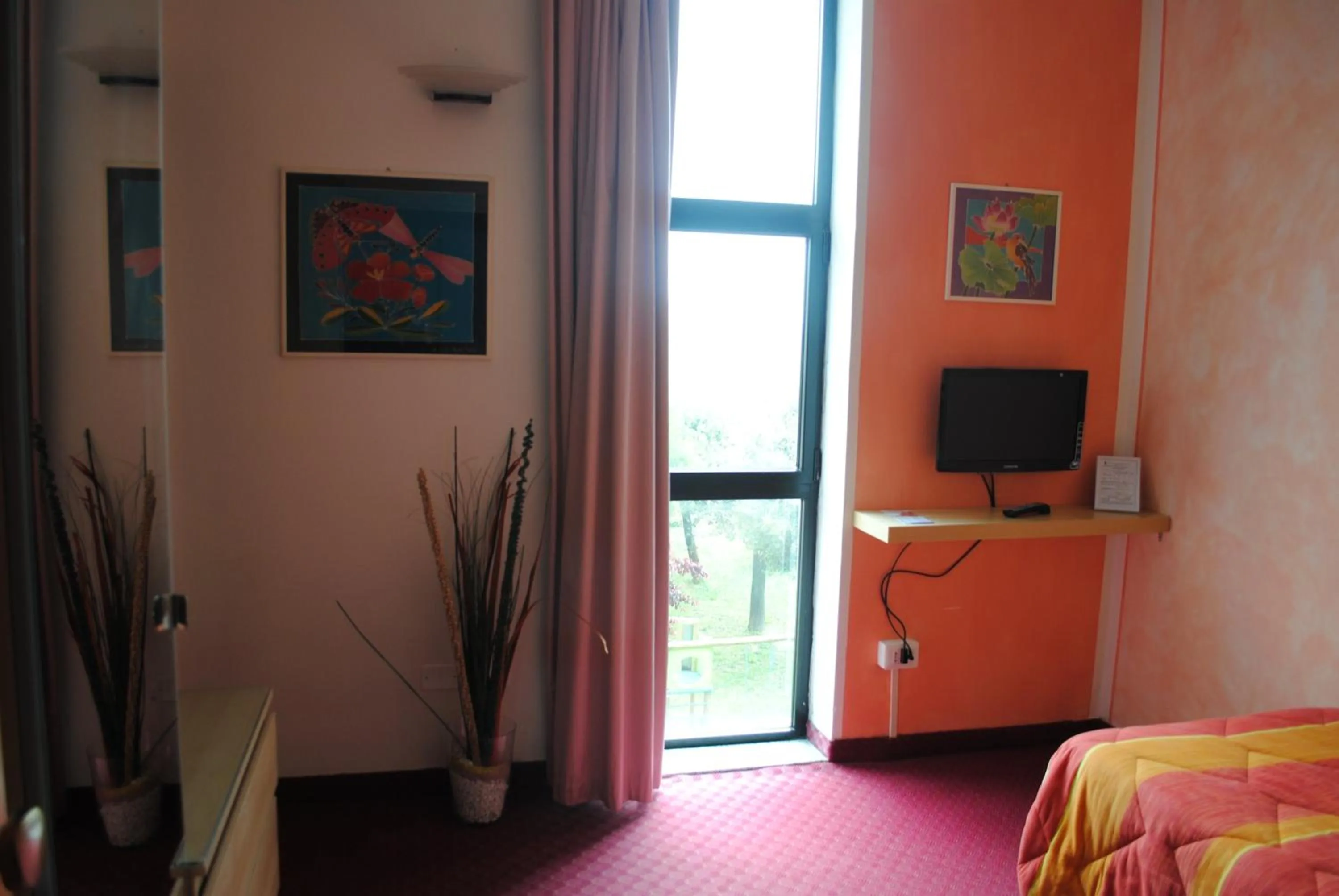 TV and multimedia, Bed in Hotel Giannina