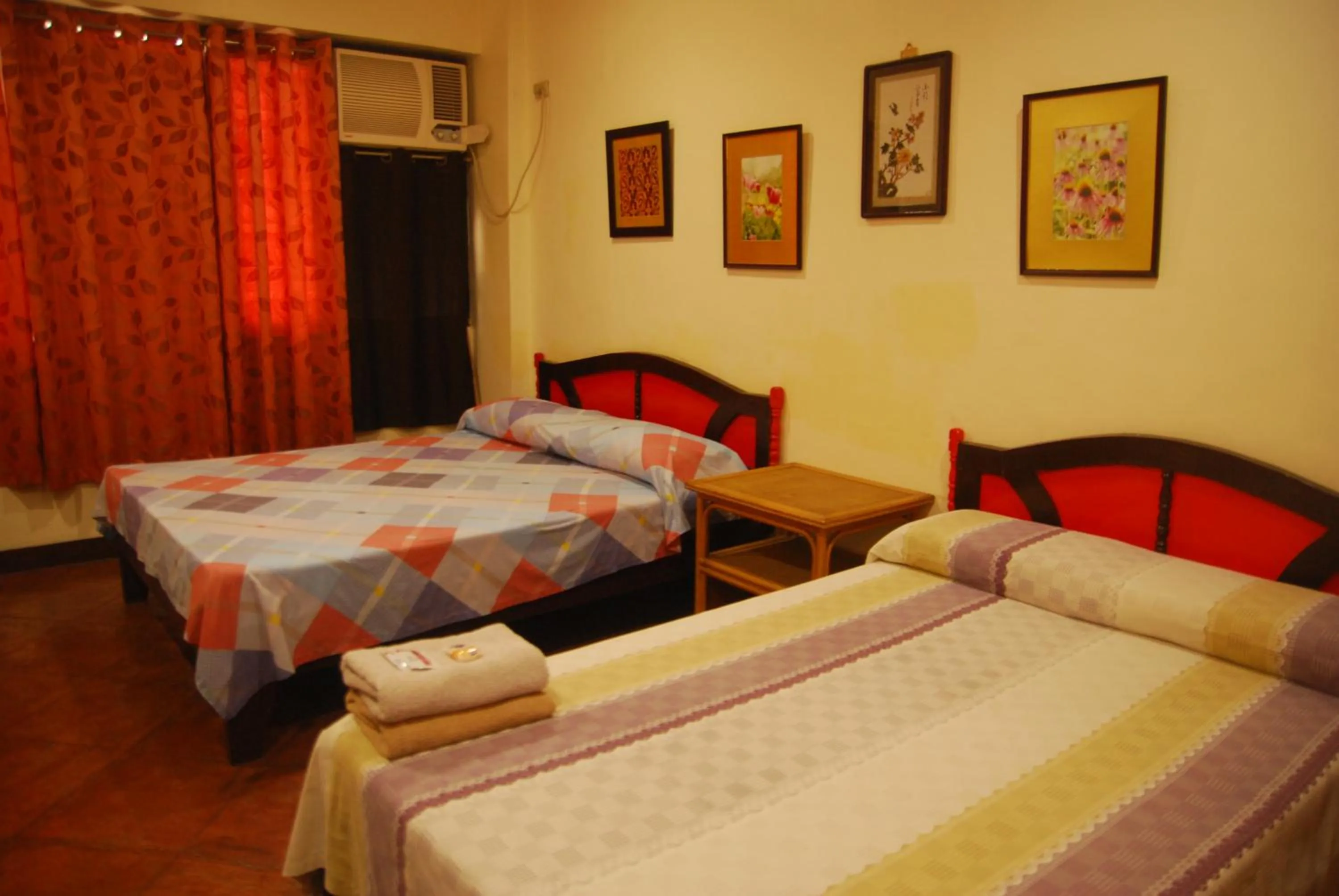 Bed in Centro Mactan Suites