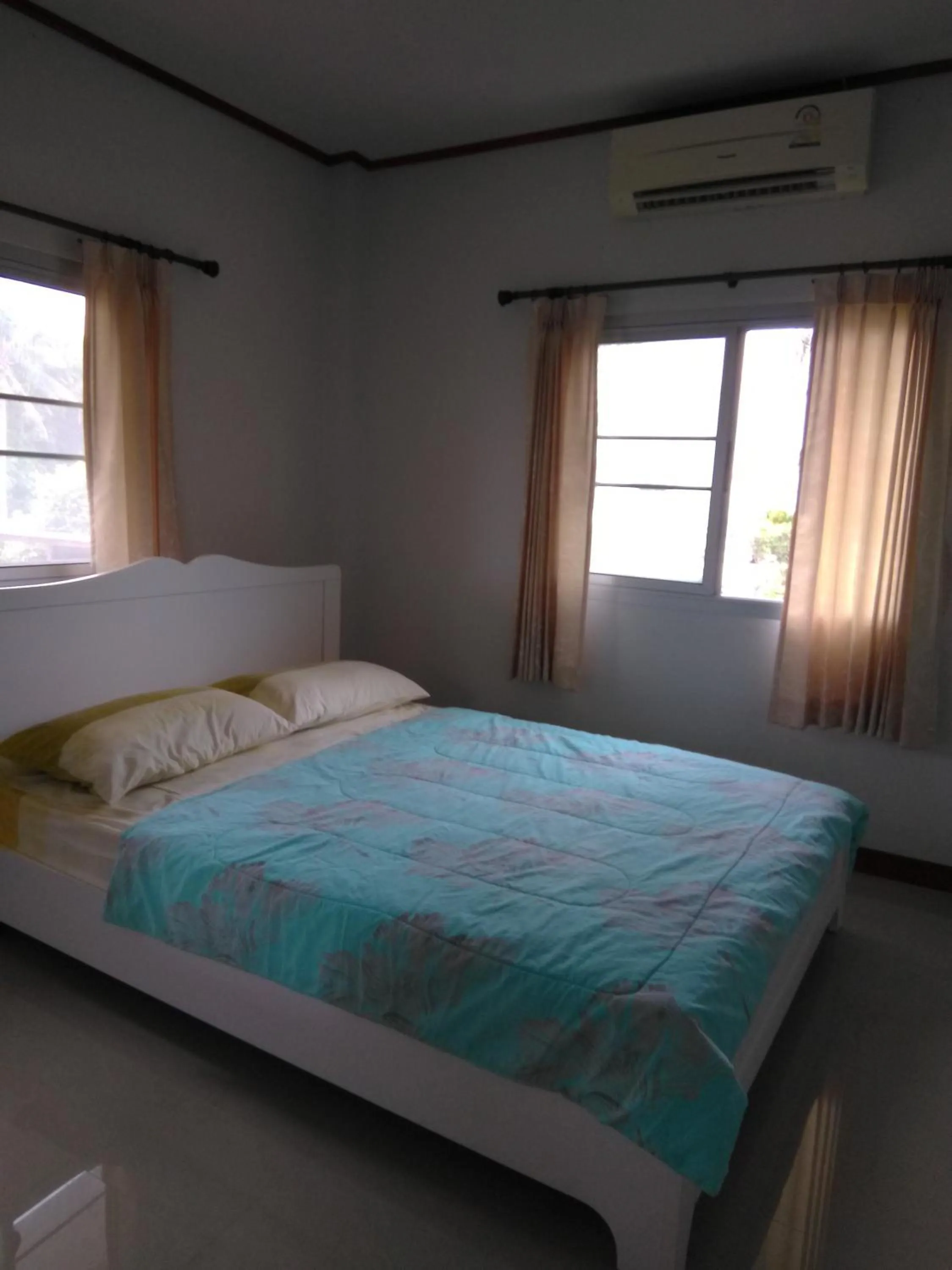 Bed in Tropicana Khophagan Resort Hotel