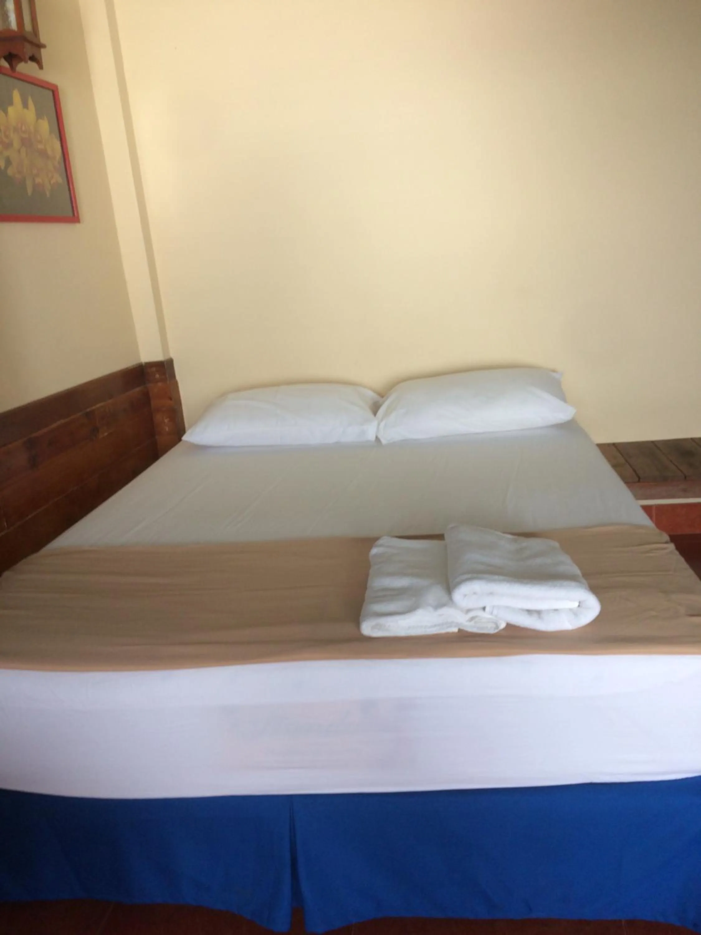 Bed in Tropicana Khophagan Resort Hotel