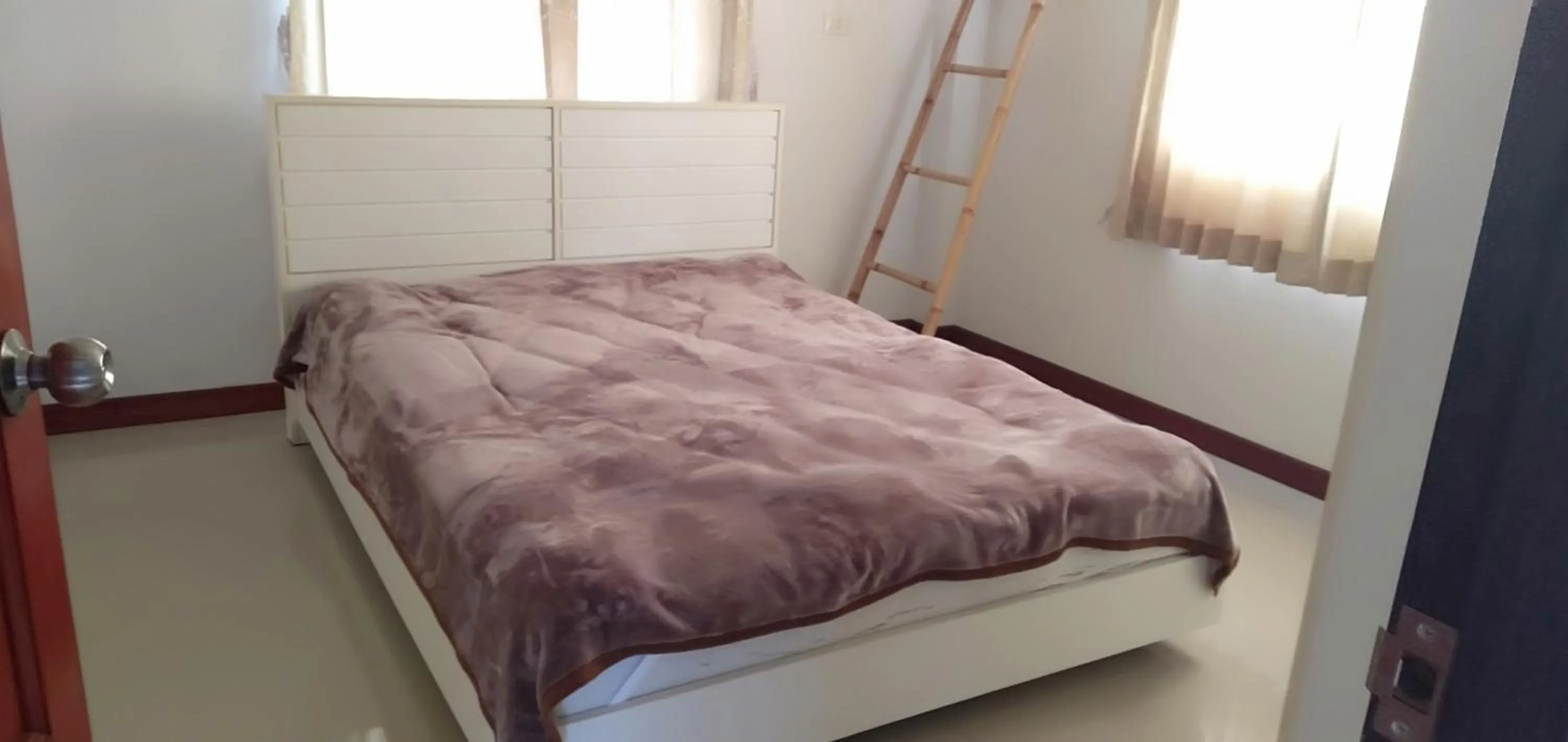 Bed in Tropicana Khophagan Resort Hotel