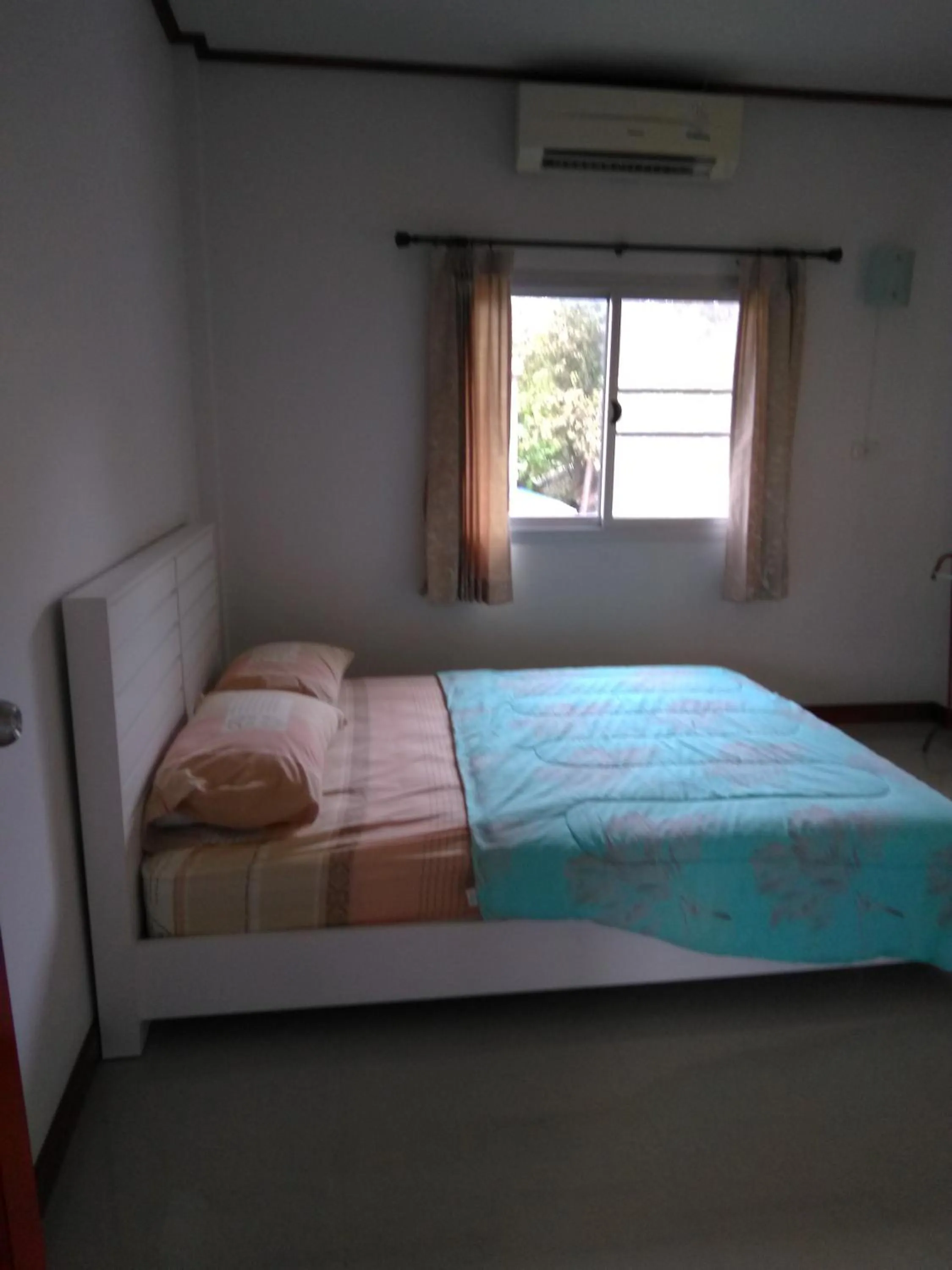 Bed in Tropicana Khophagan Resort Hotel