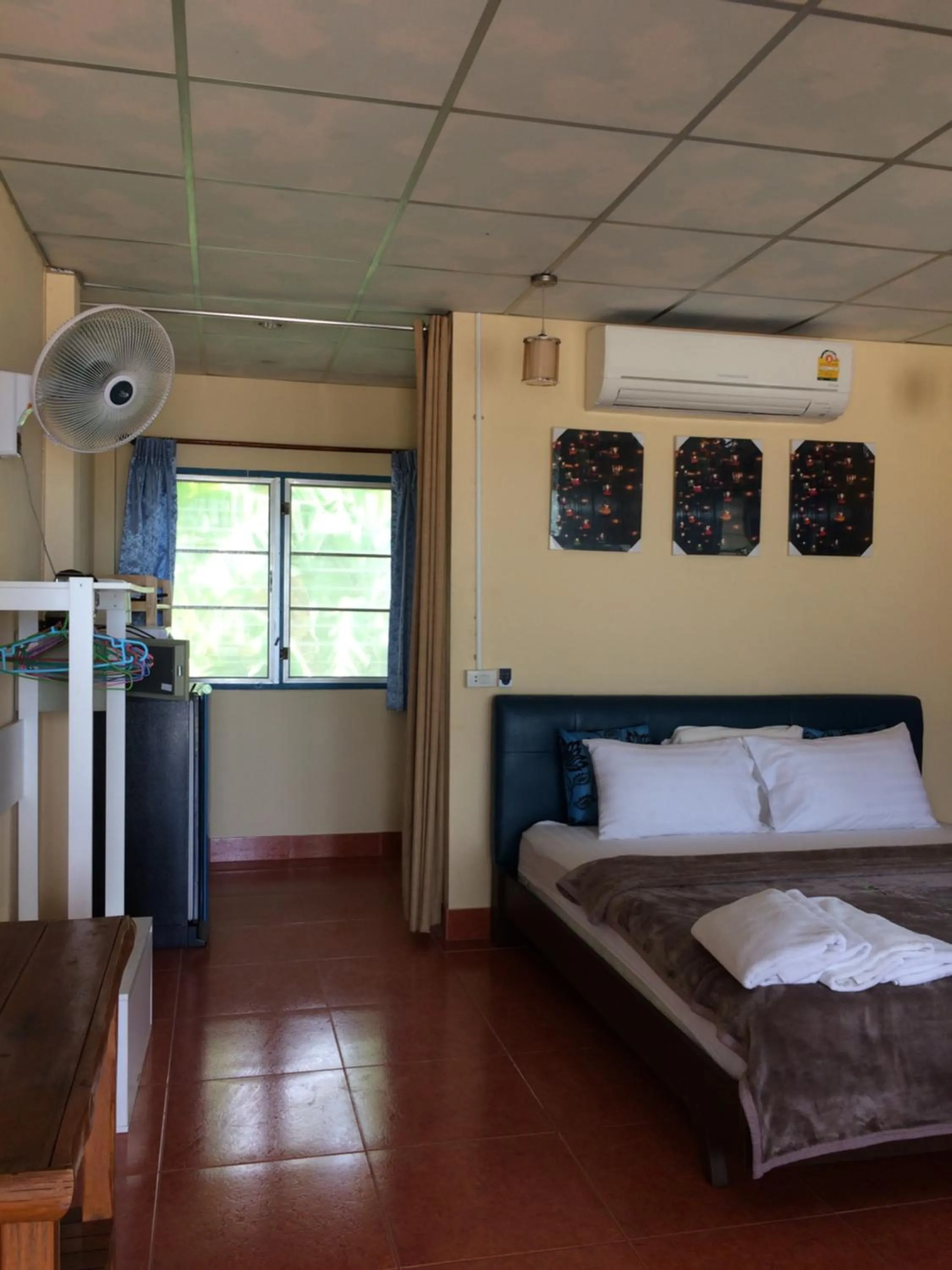 Bed in Tropicana Khophagan Resort Hotel