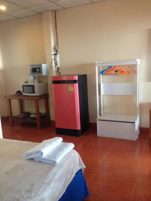 Bed in Tropicana Khophagan Resort Hotel