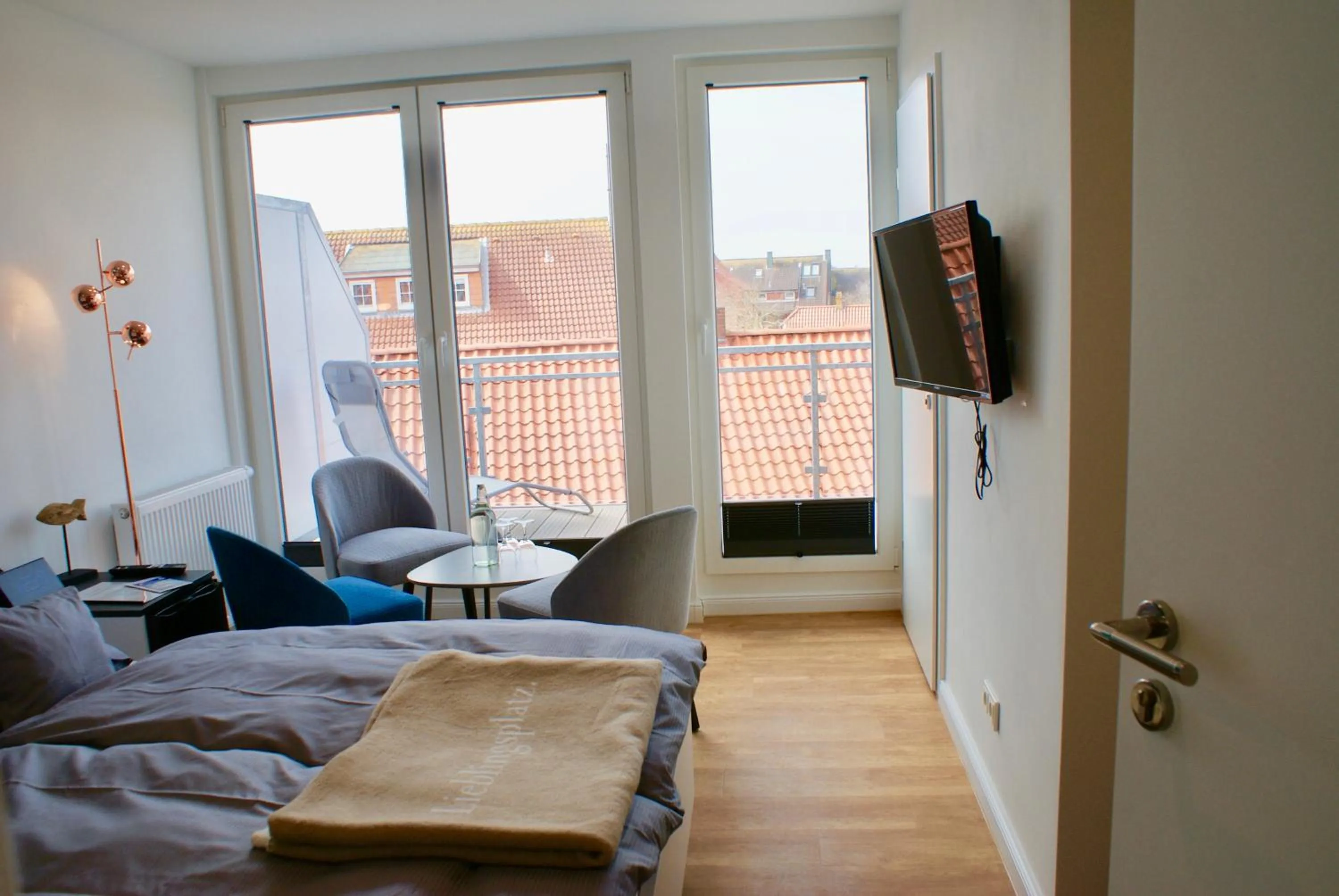 Photo of the whole room, Bed in Deichhotel Rose