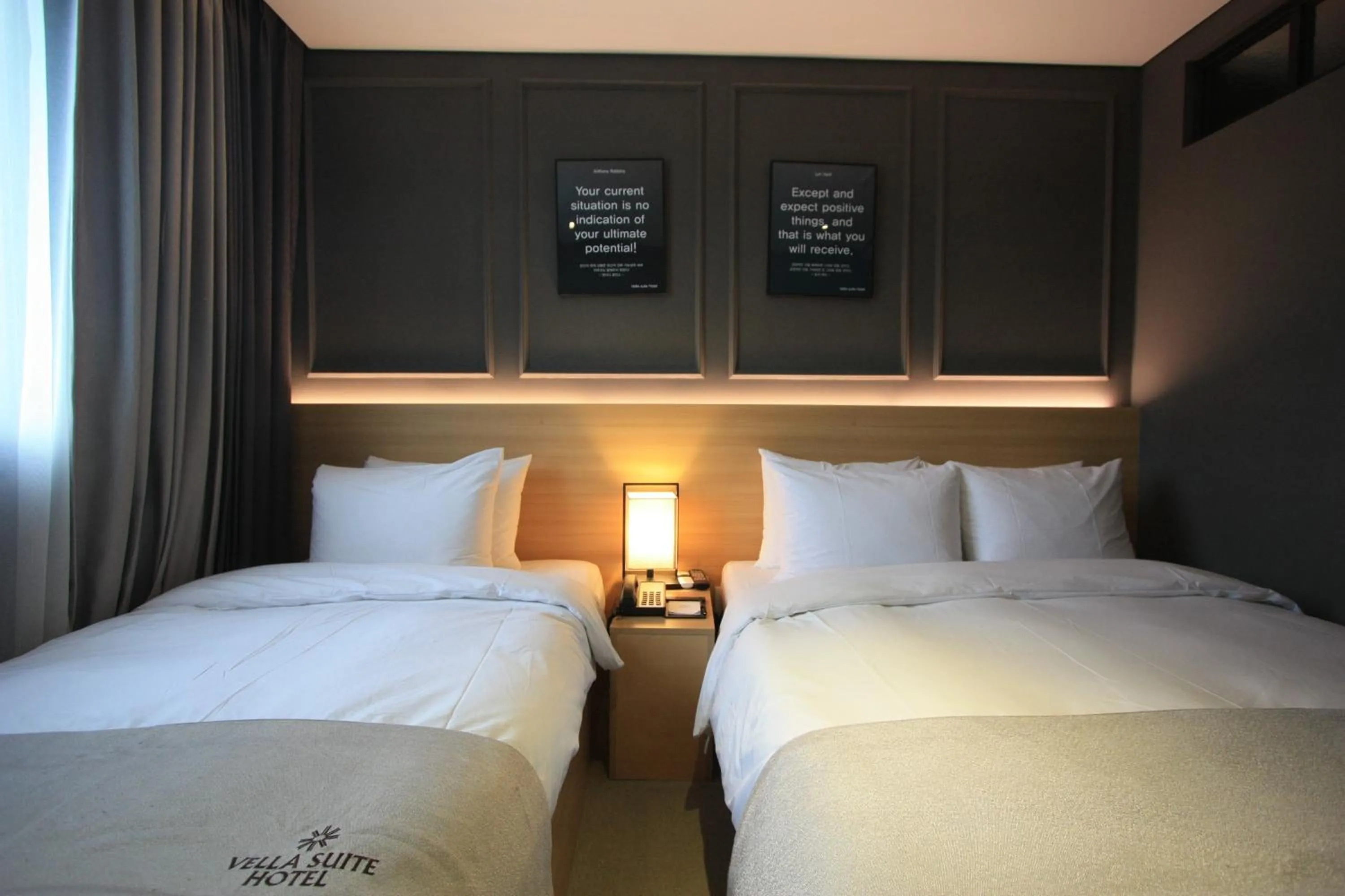 Bed in Vella Suite Hotel