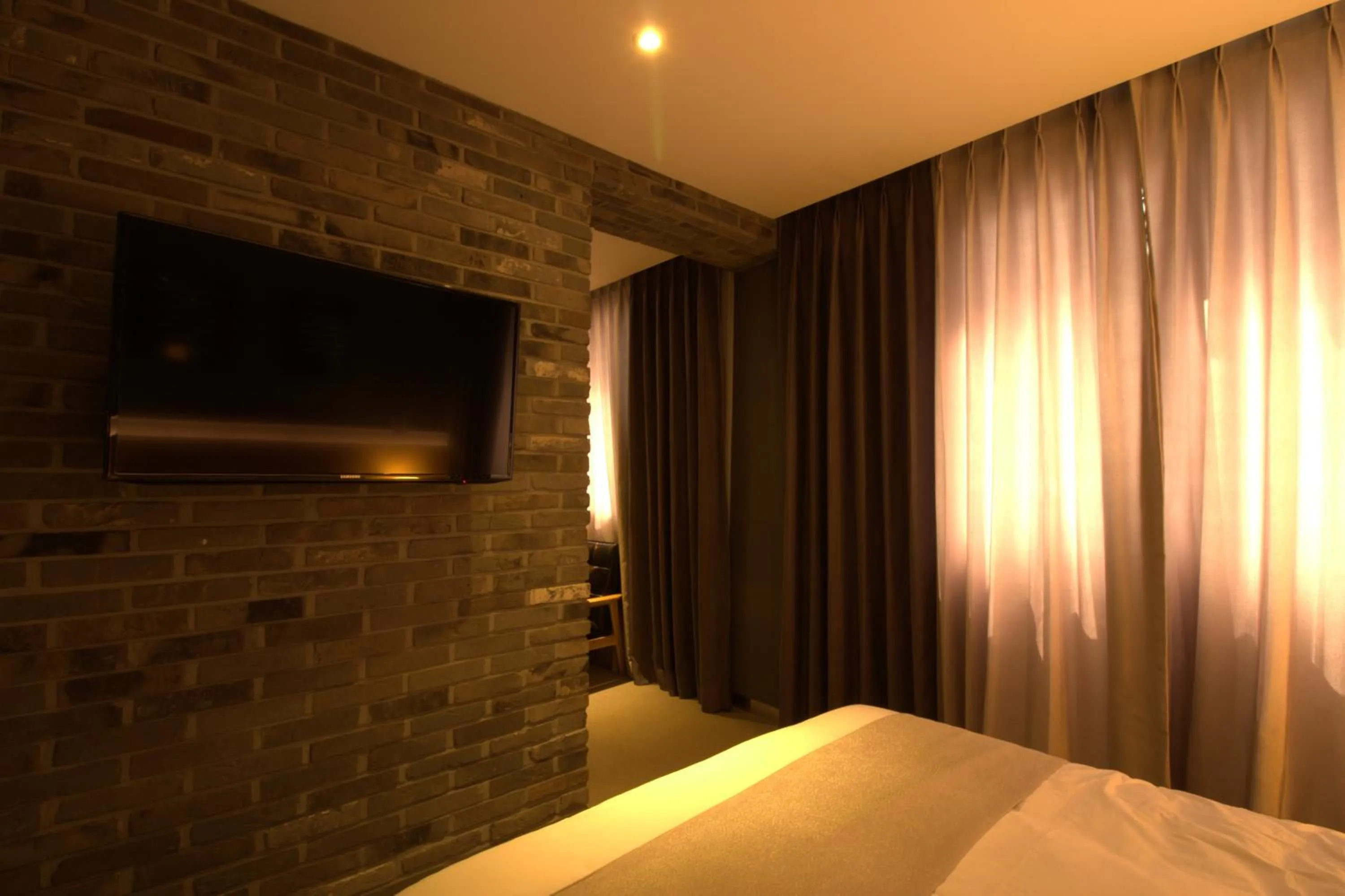 Bedroom, Bed in Vella Suite Hotel