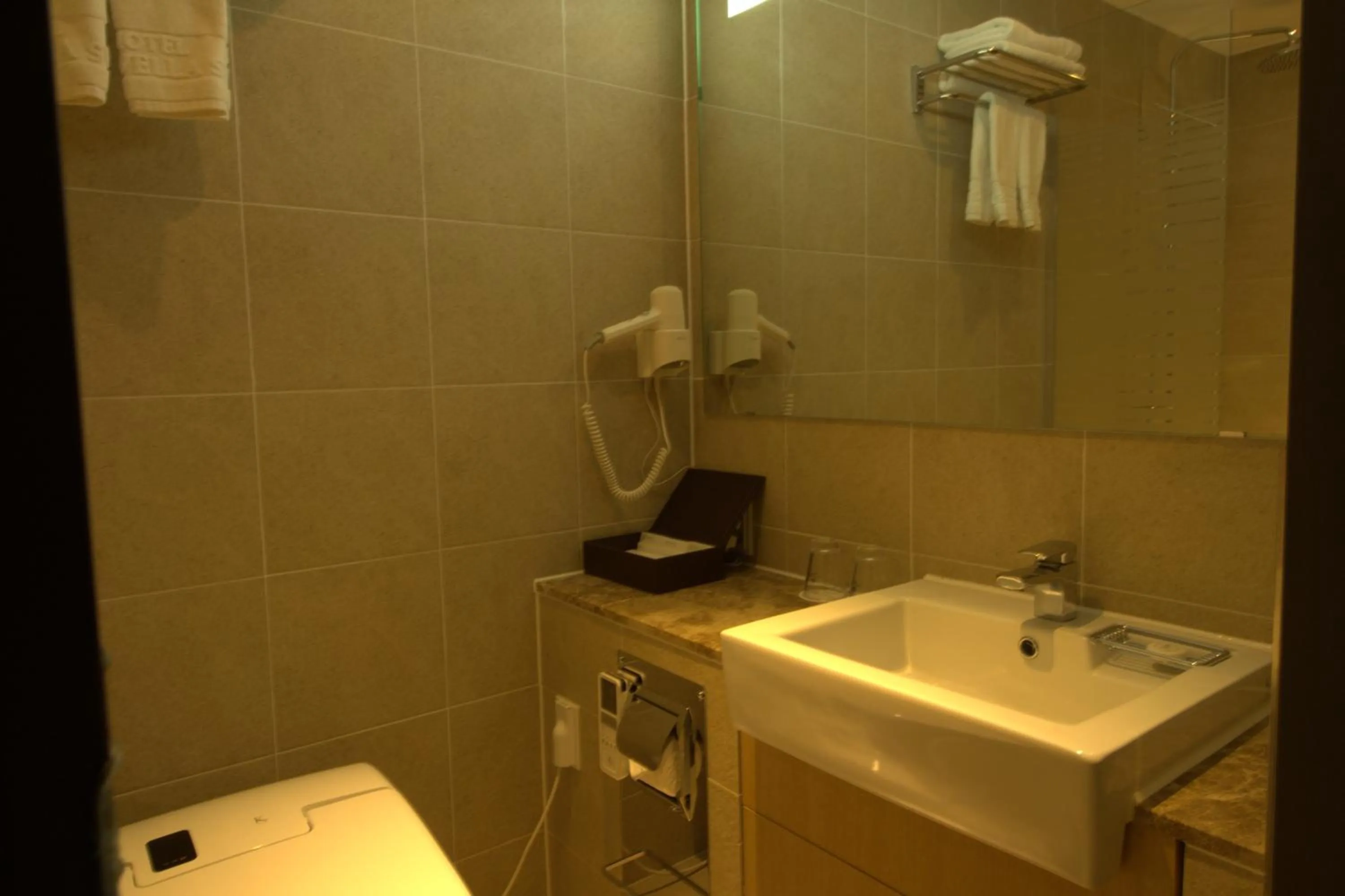 Bathroom in Vella Suite Hotel