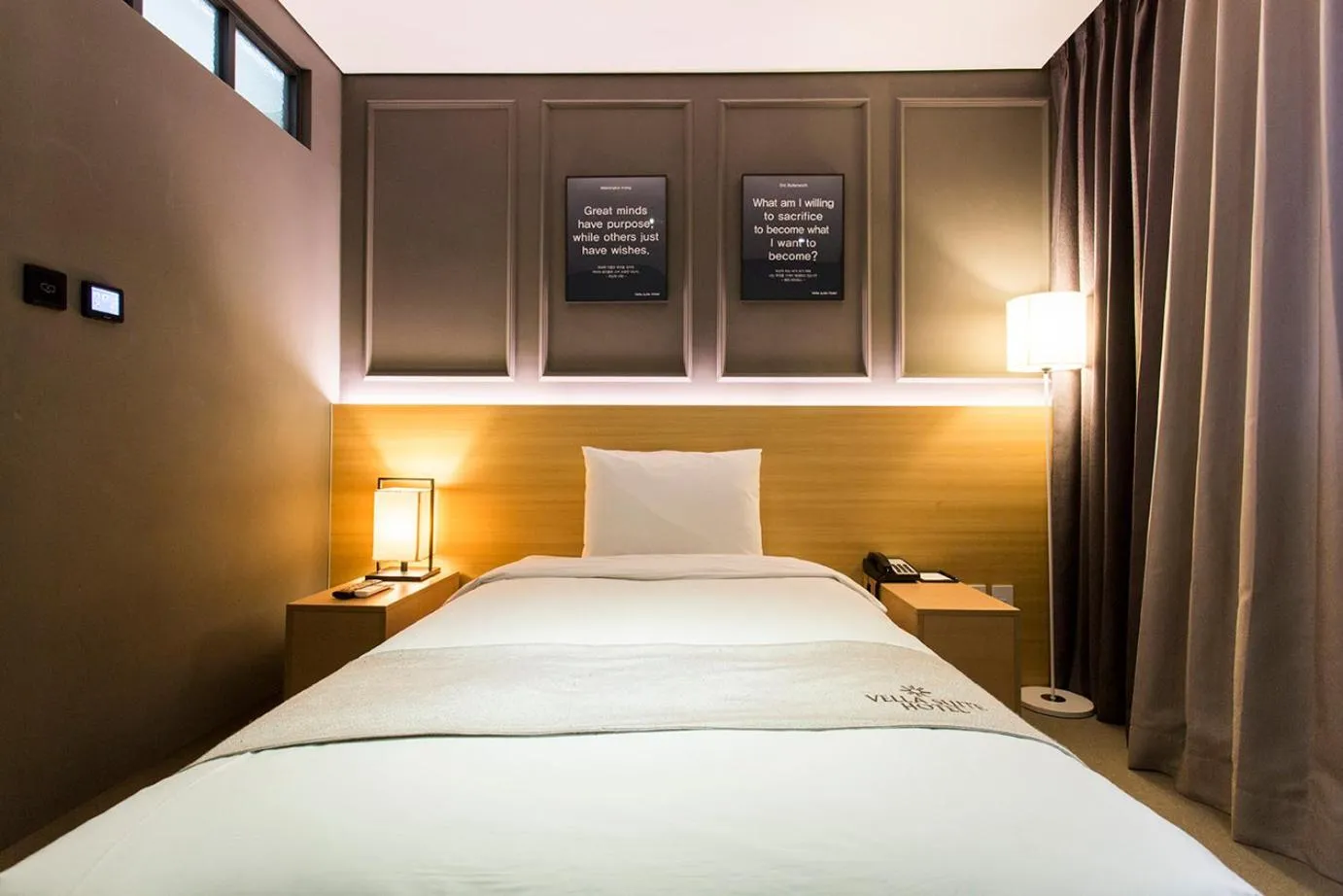 Bed in Vella Suite Hotel