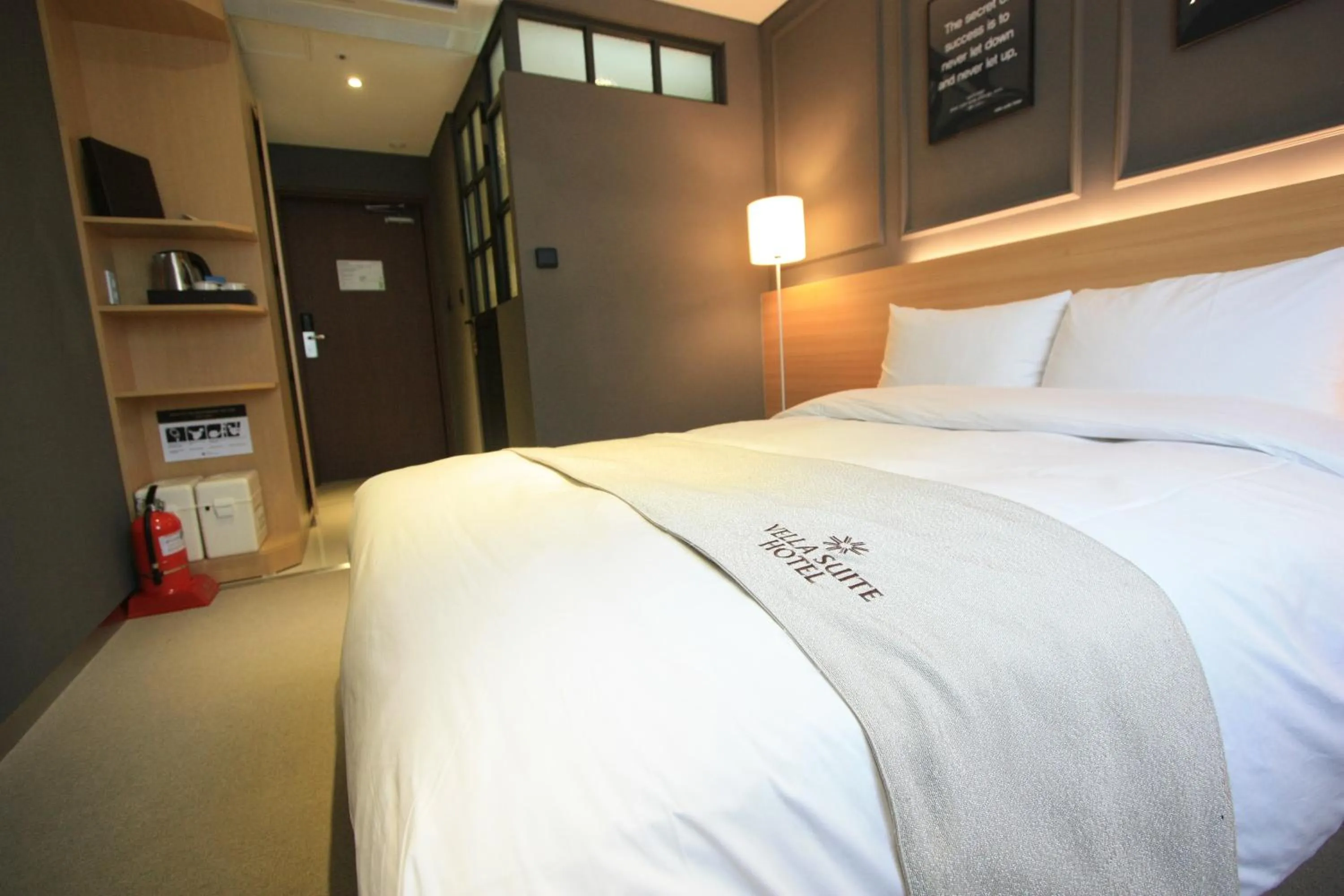 Bed in Vella Suite Hotel