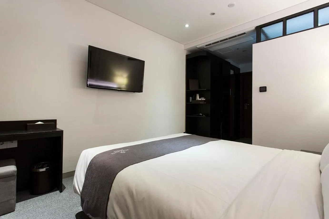 Bed in Vella Suite Hotel