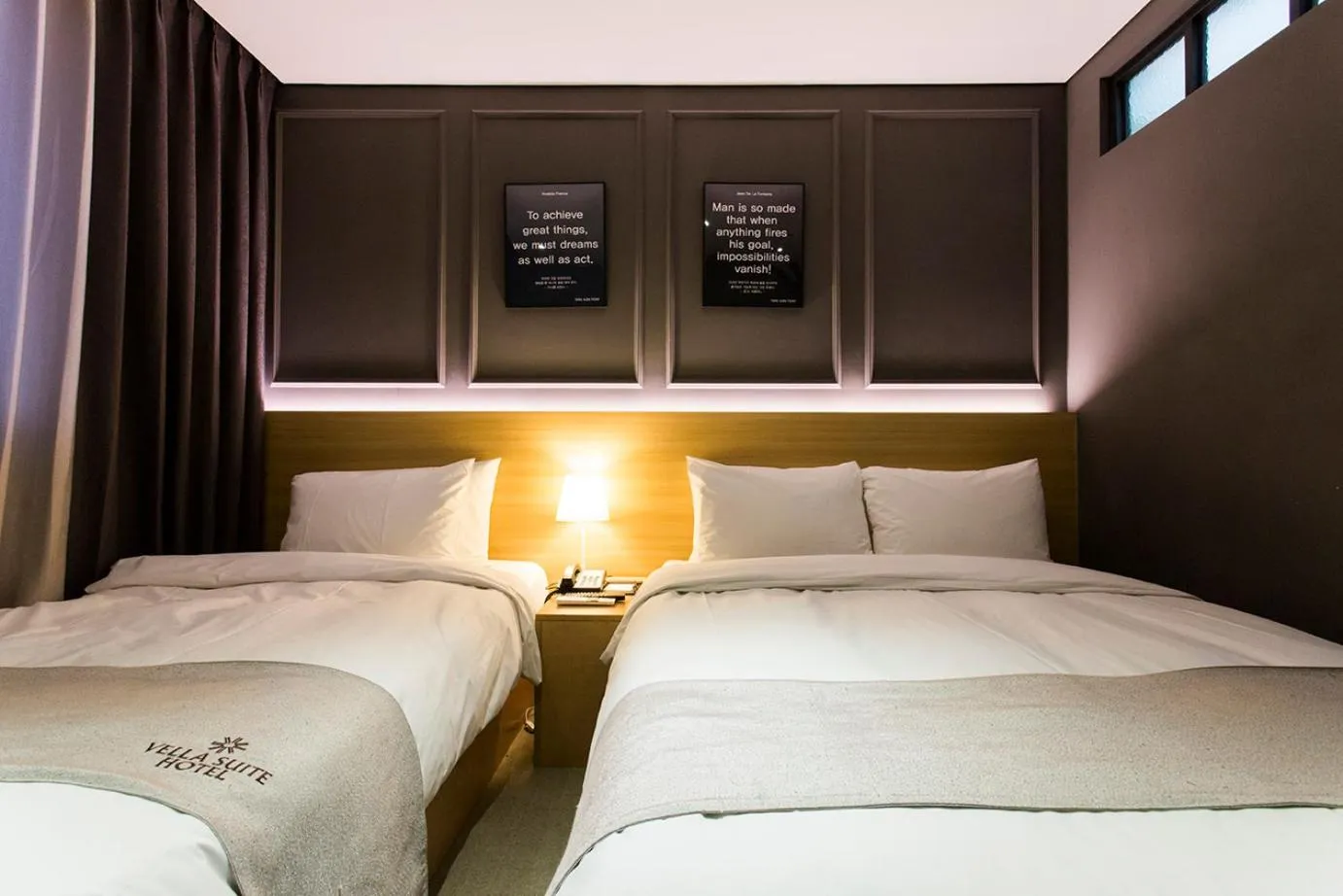 Bed in Vella Suite Hotel