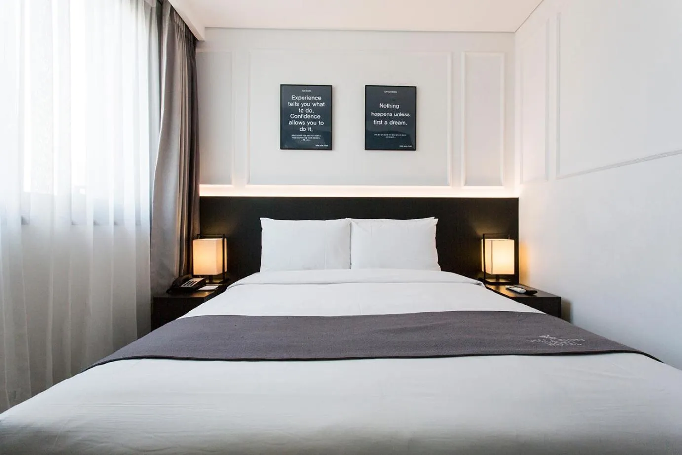 Bed in Vella Suite Hotel