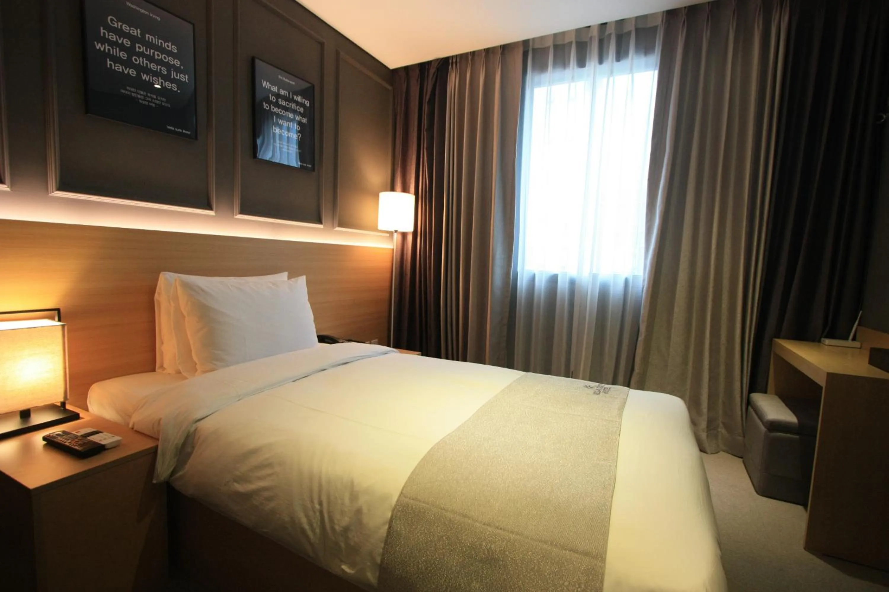 Bed in Vella Suite Hotel