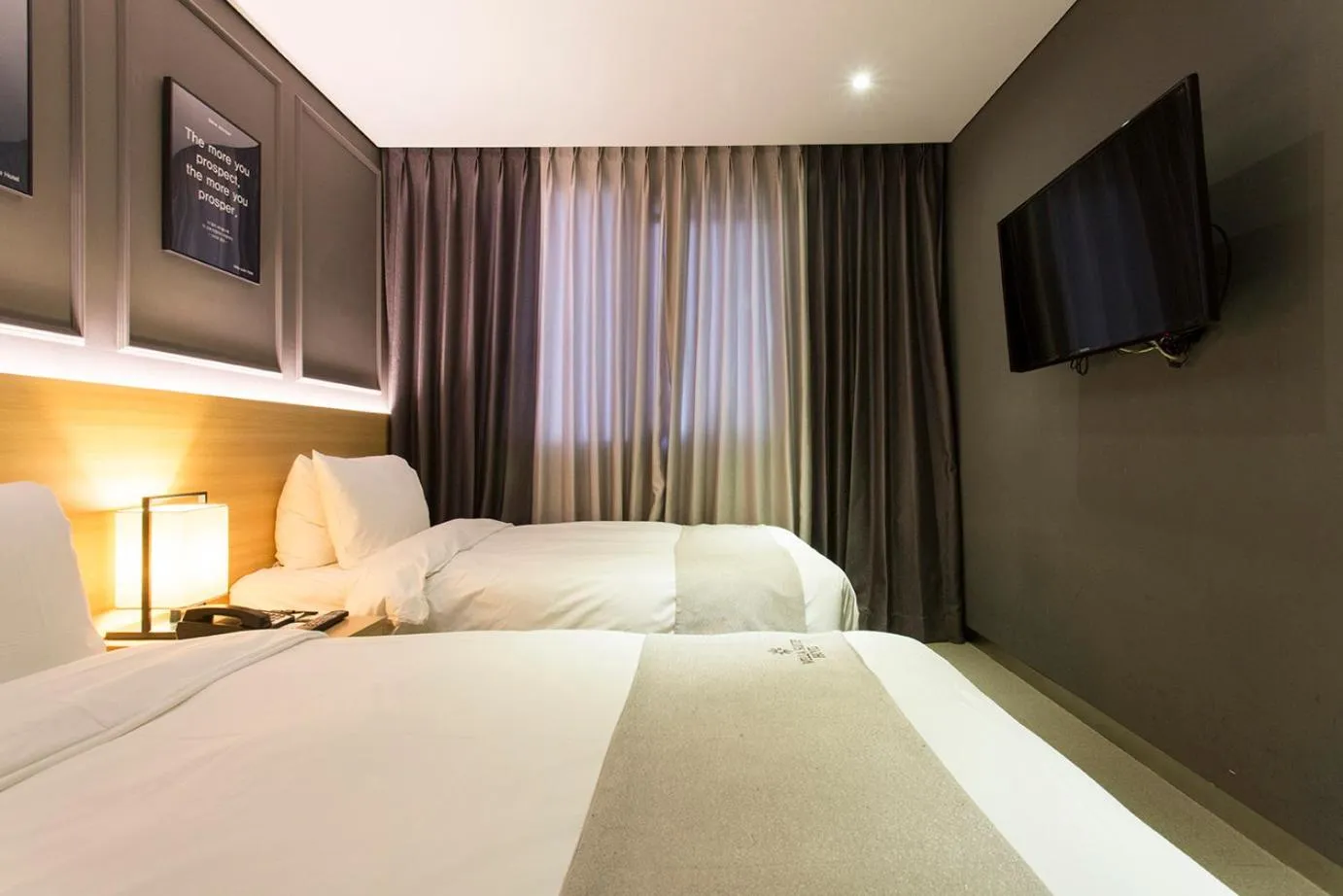 Bed in Vella Suite Hotel