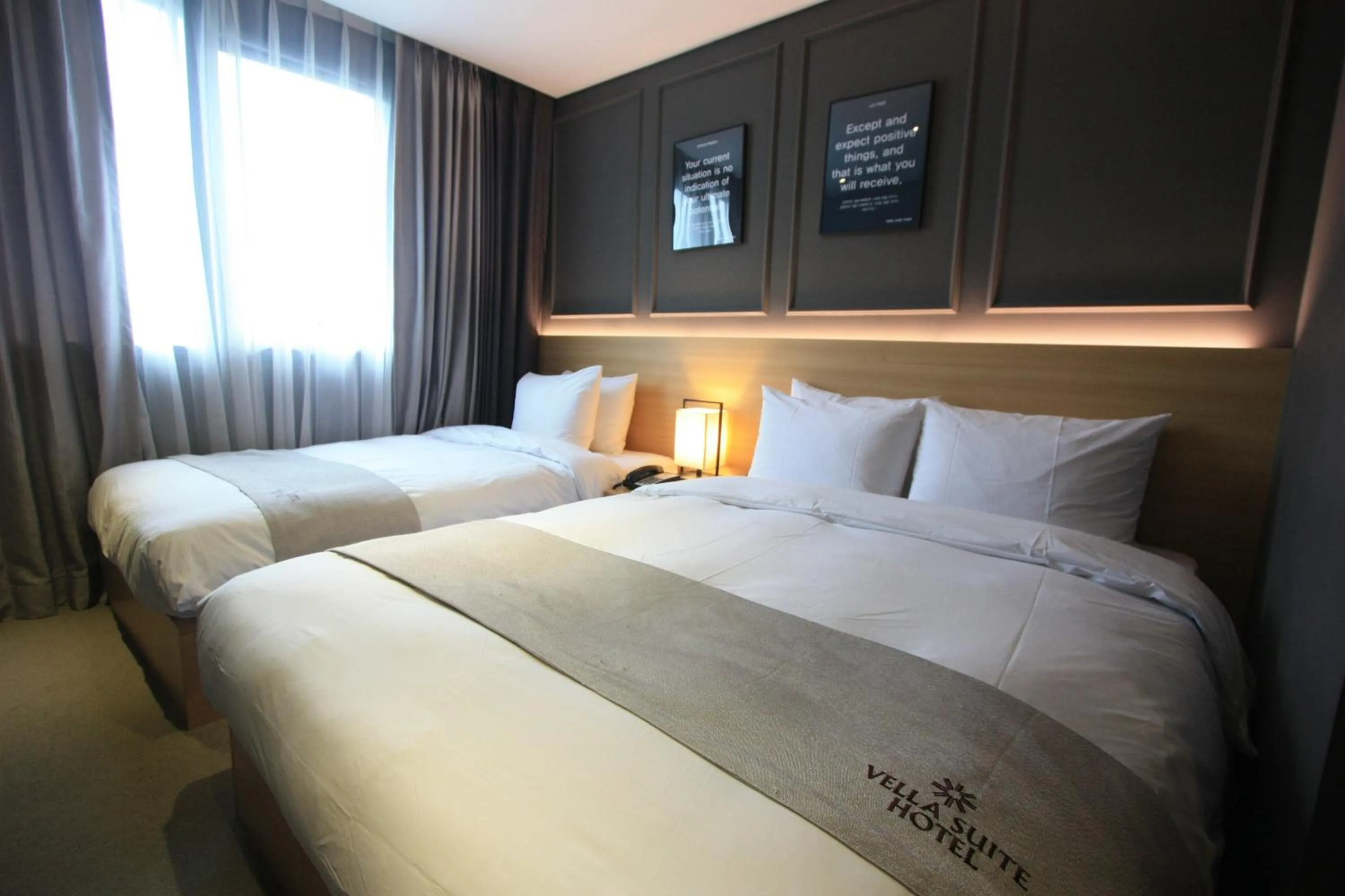 Bed in Vella Suite Hotel