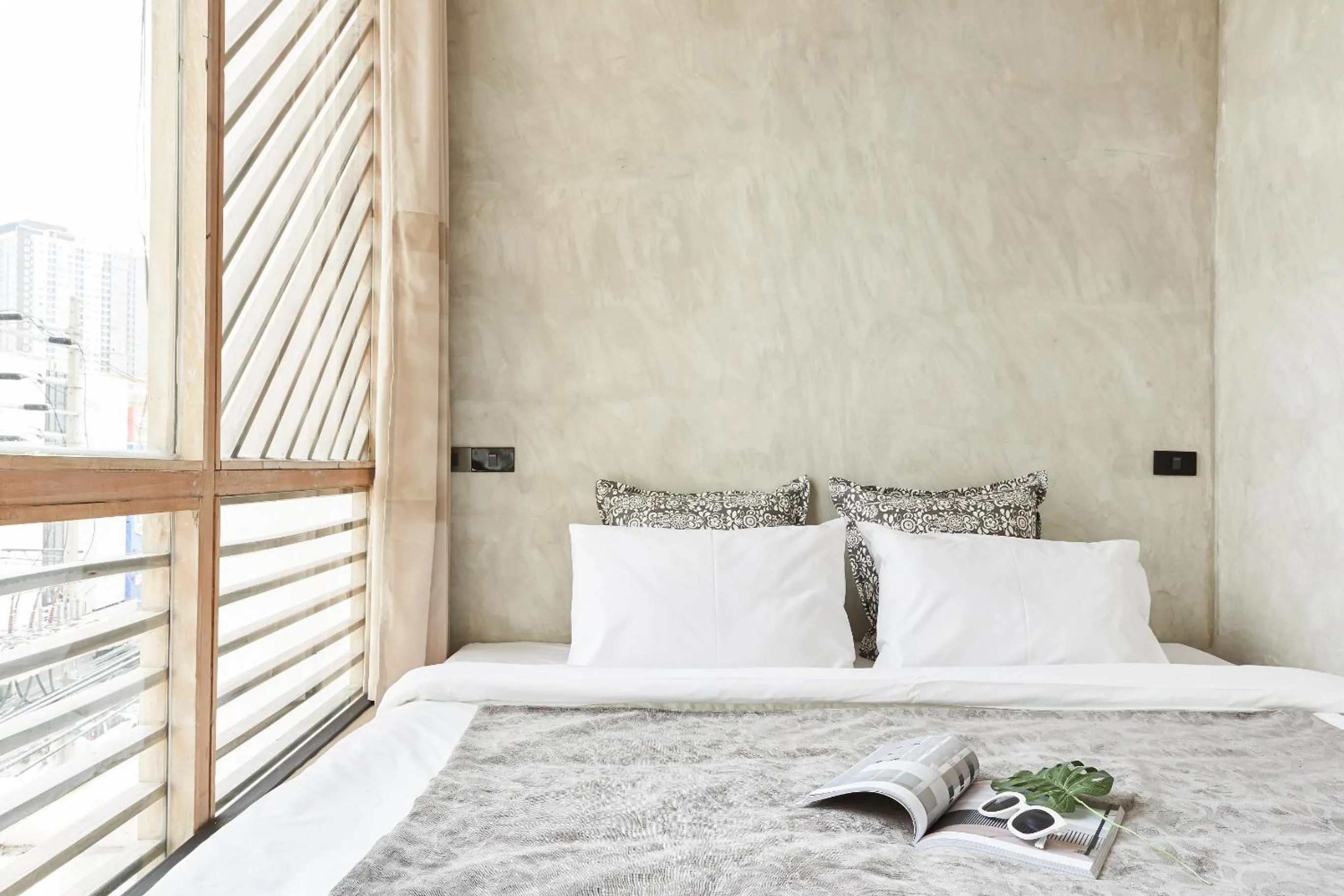 Bed in Vann Bangkok Boutique House