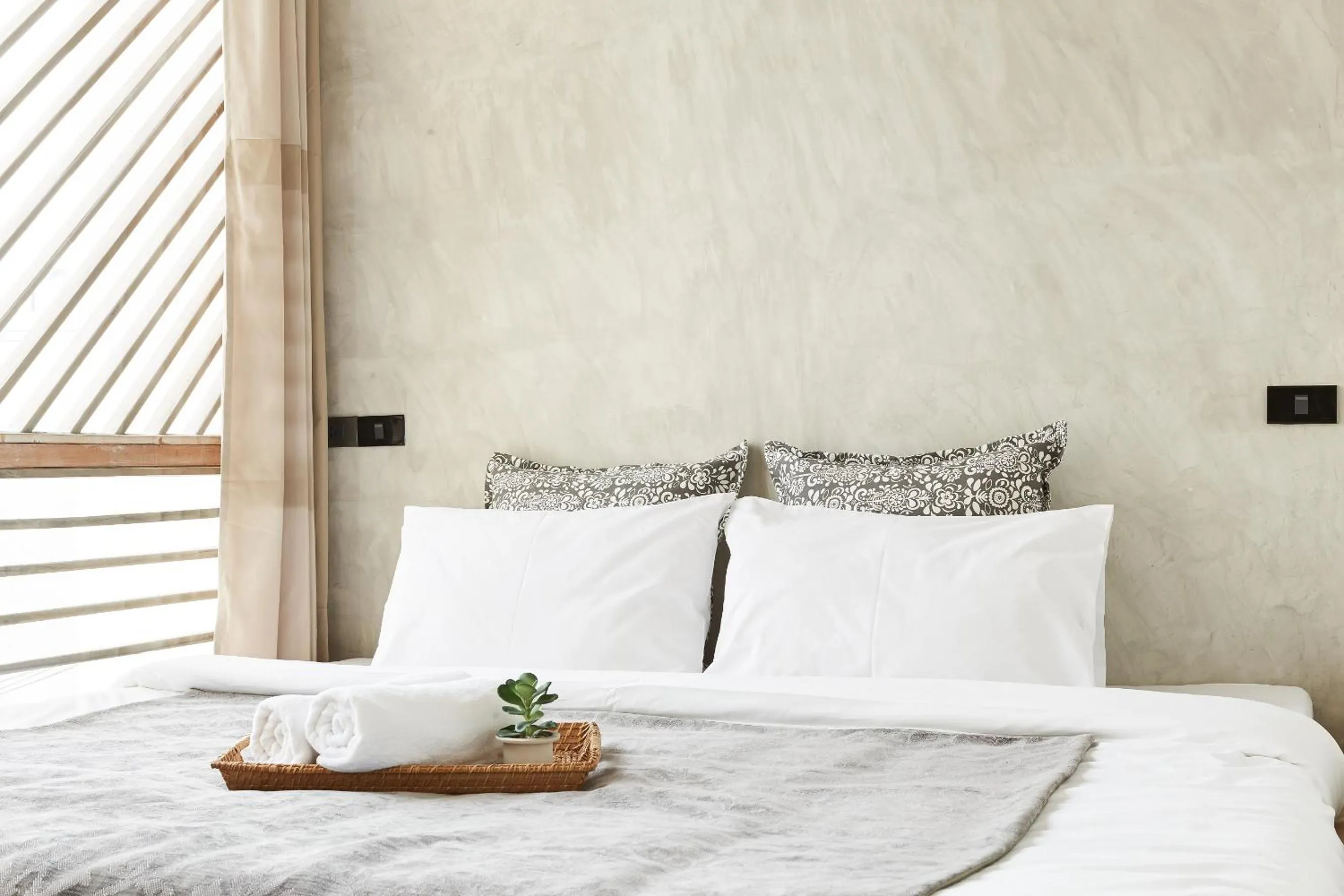 Bed in Vann Bangkok Boutique House