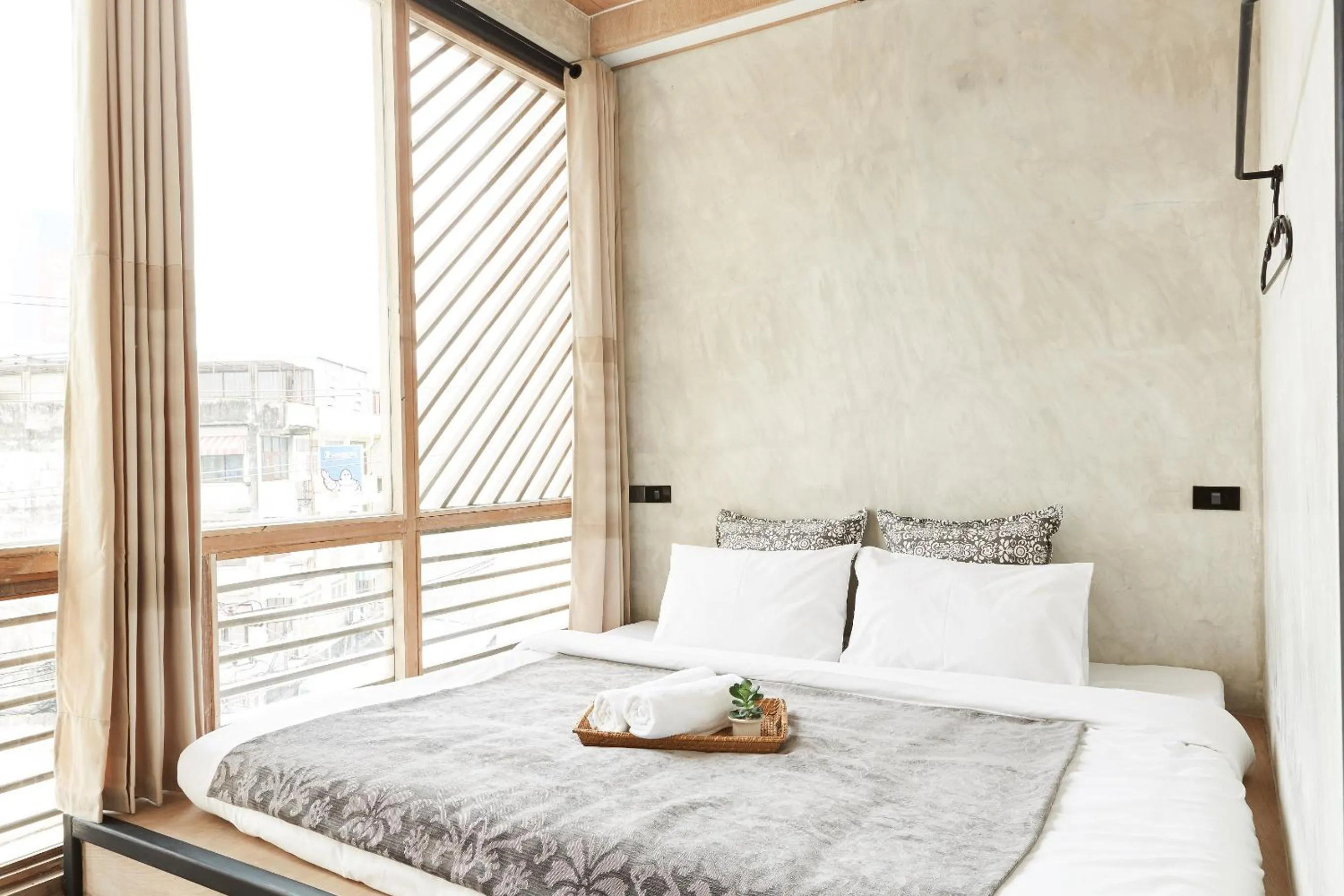 Bed in Vann Bangkok Boutique House