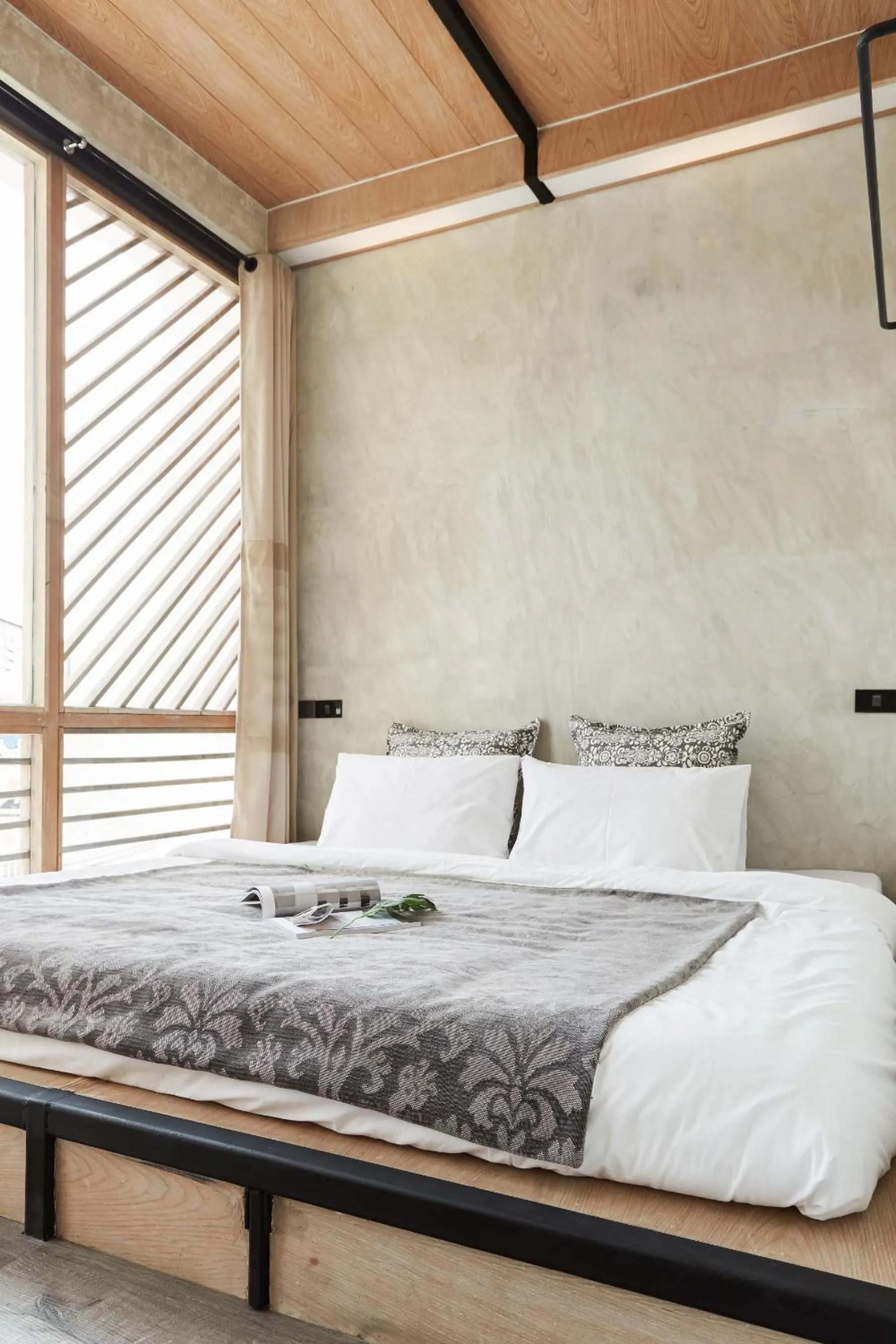 Bed in Vann Bangkok Boutique House