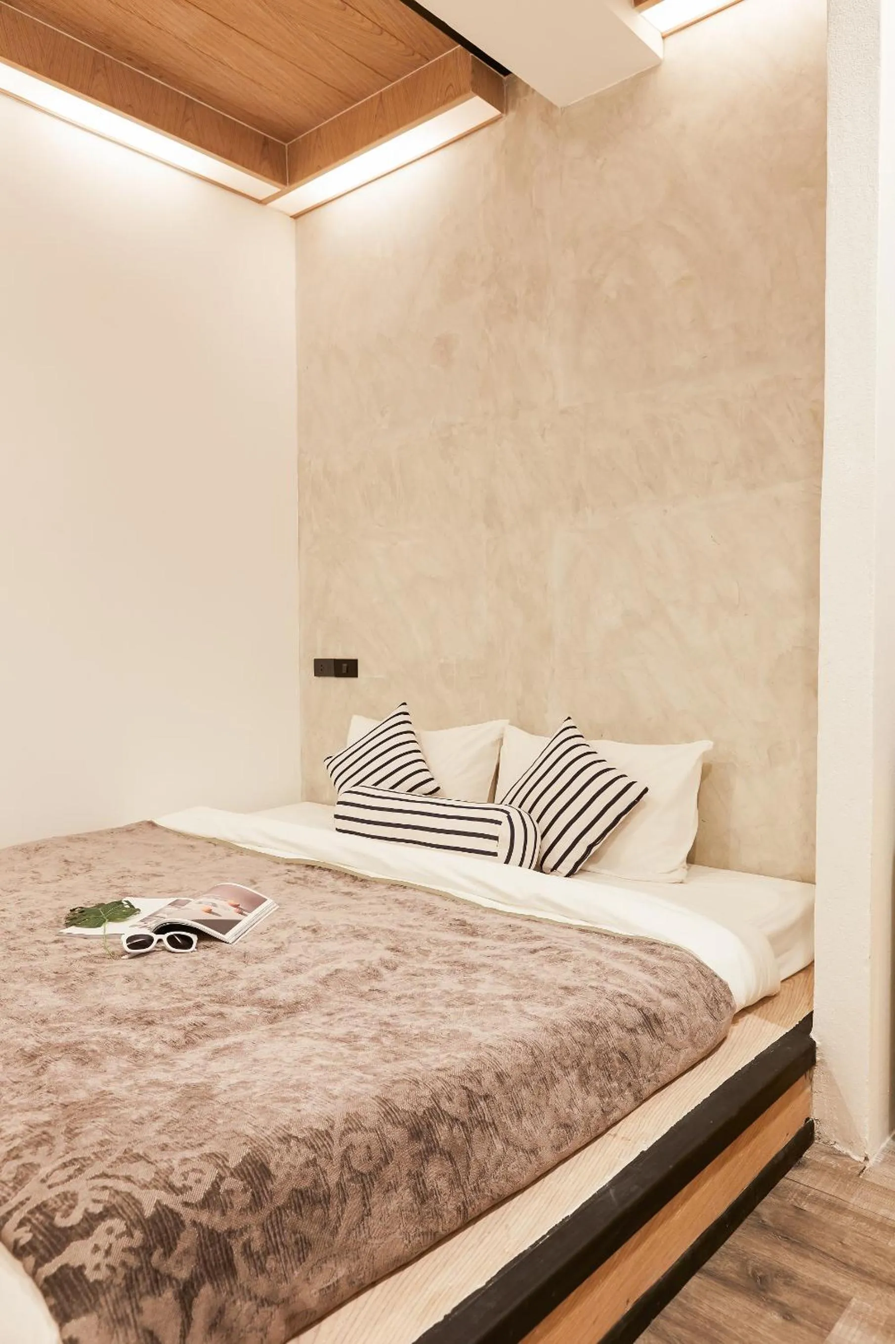 Bed in Vann Bangkok Boutique House