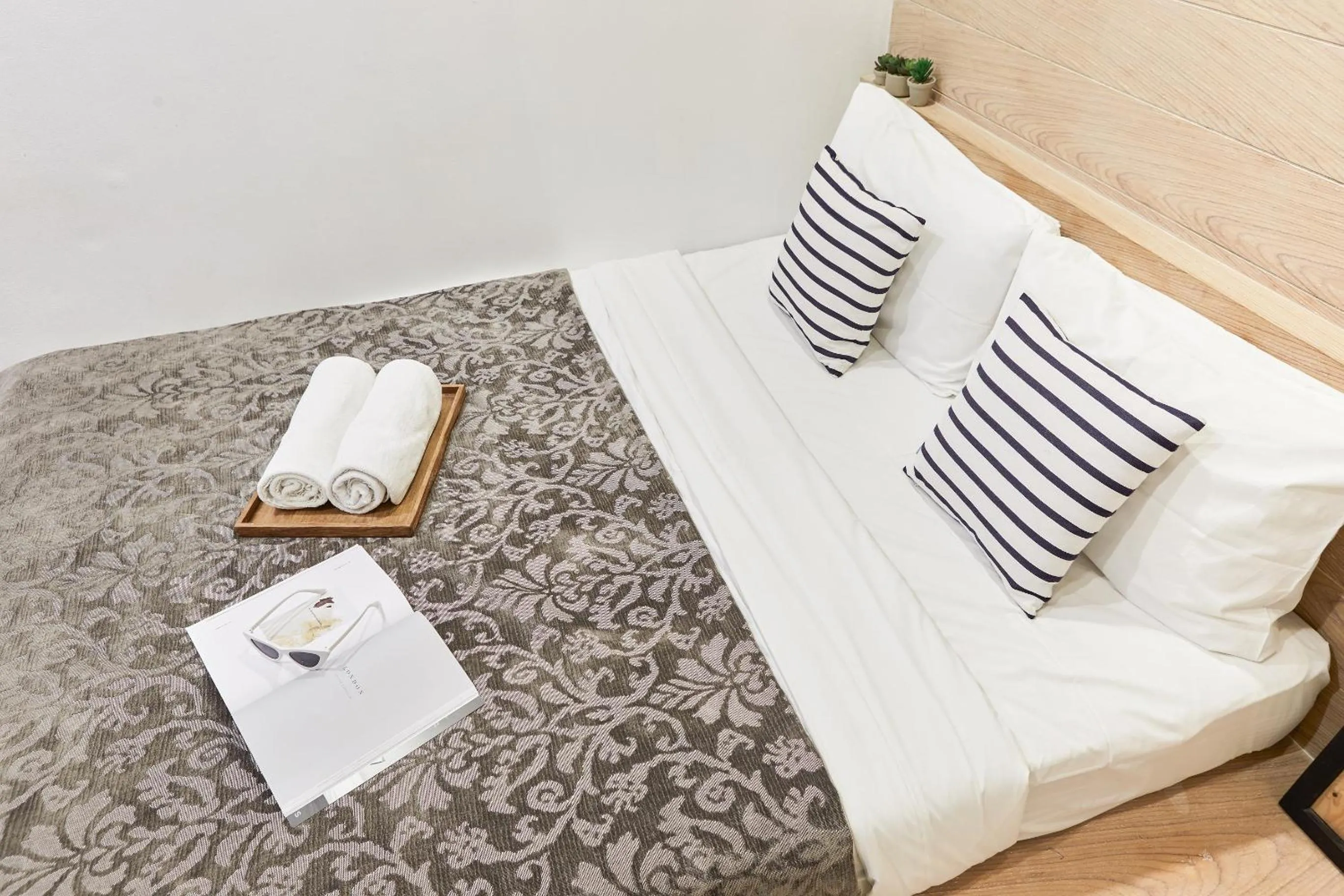 Bed in Vann Bangkok Boutique House