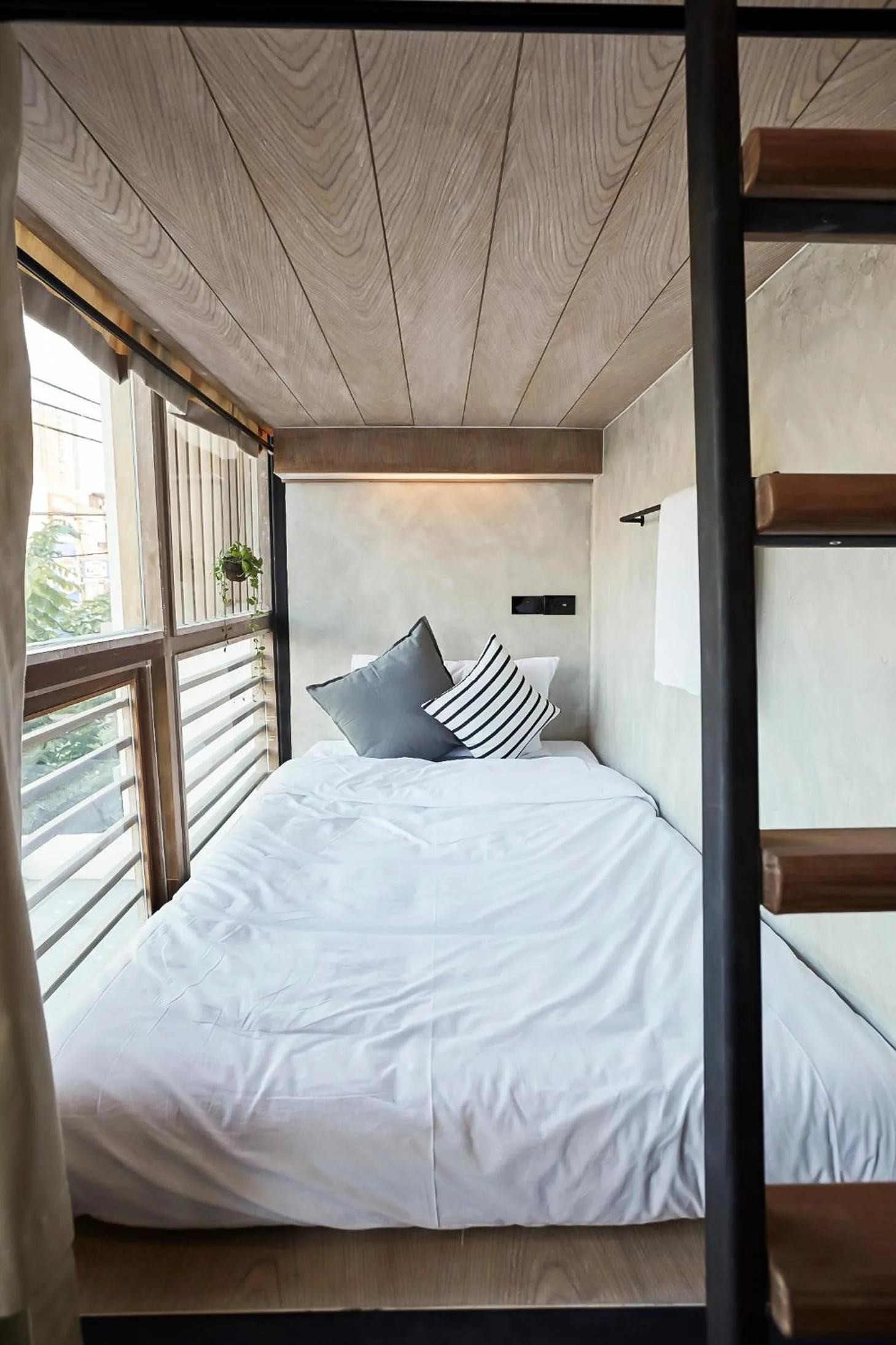 Bed in Vann Bangkok Boutique House