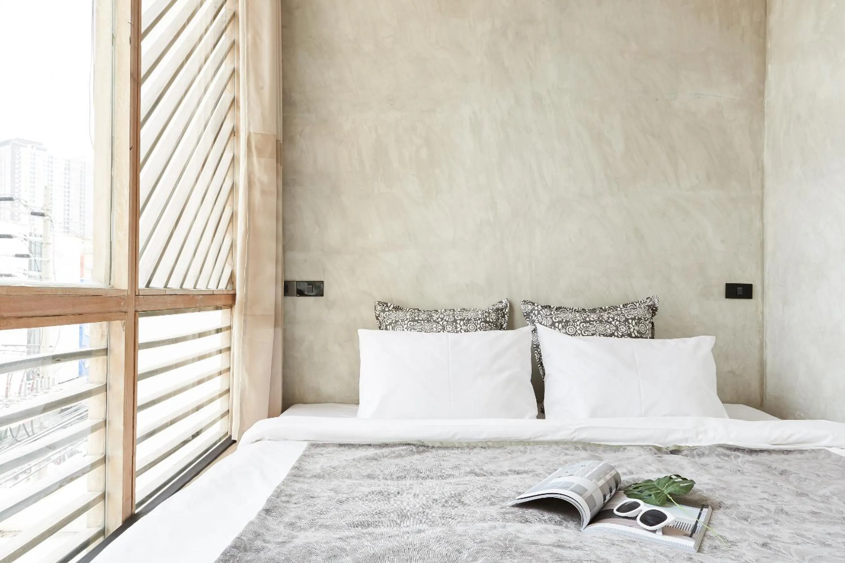 Bed in Vann Bangkok Boutique House